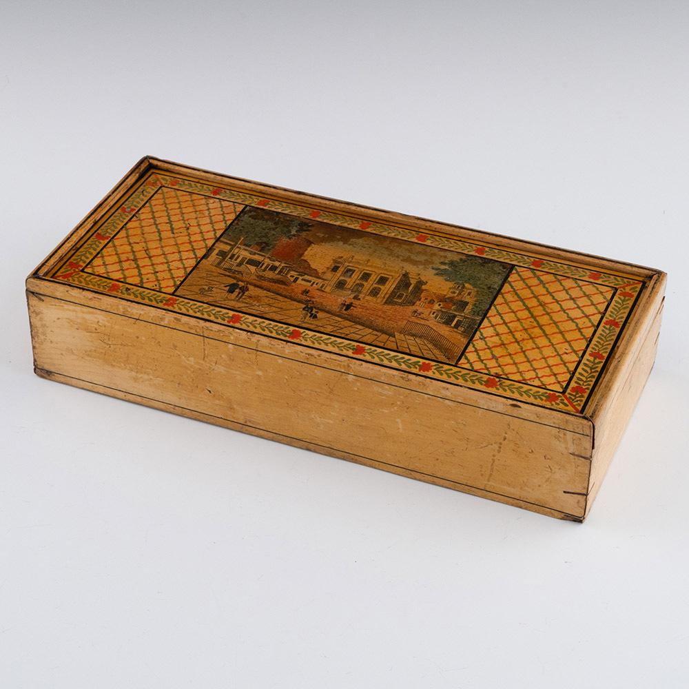 Heading : Tunbridge ware stationery box with Image of the Pantiles
Date : c1810
Period : Regency
Origin : Tunbridge Wells, Kent
Decoration :Central image of the Pantiles with the view being of the famous Chalybeate Spring. Green and red painted