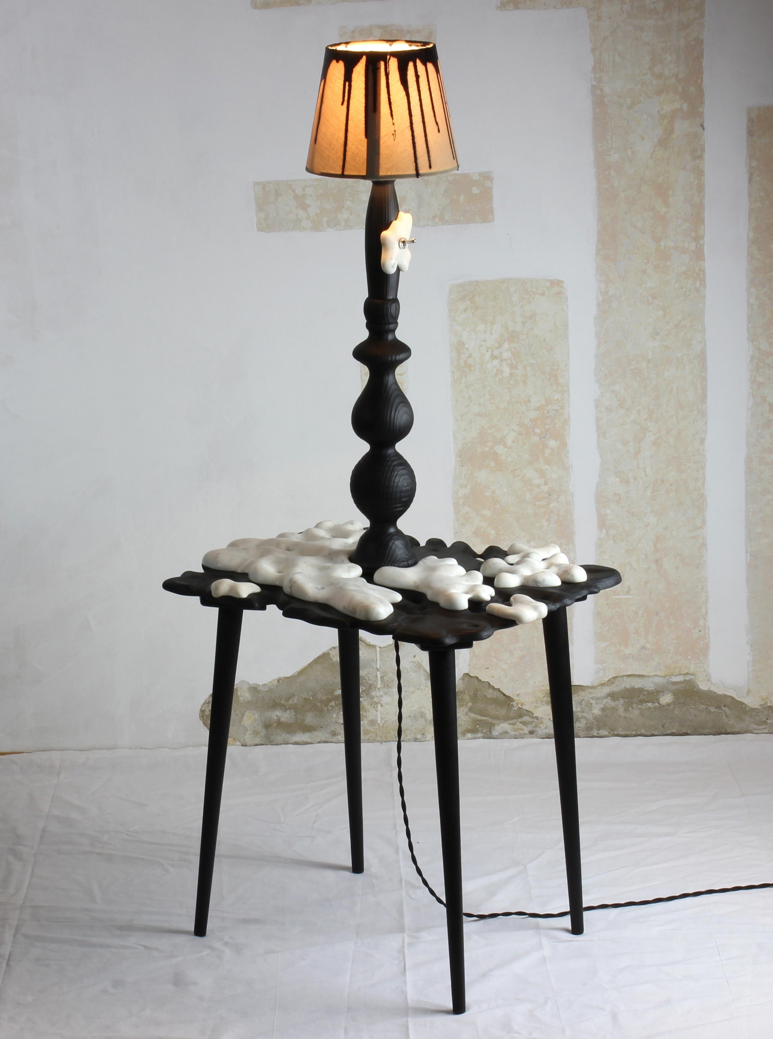 Lámpara de pie Tundra by Gabor Gobi
Pieza única.
Dimensiones: P 40 x An 50 x Al 116 cm.
Materiales: Madera de haya, mármol blanco y contrachapado.

Esta lámpara de pie única se ha fabricado a partir de una mesa auxiliar reutilizada, una lámpara