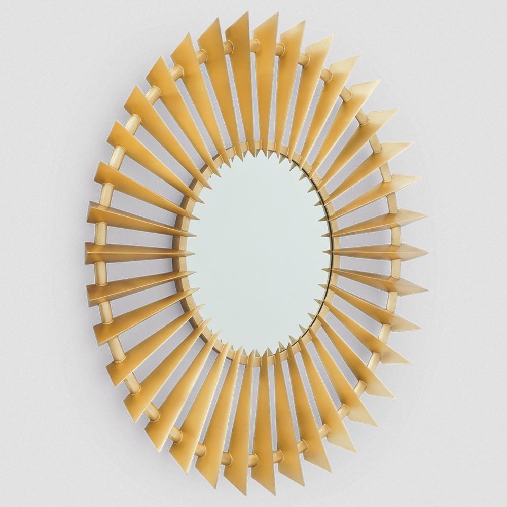 Miroir Turbine Gold avec structure en solide 
bois d'acajou sculpté. Avec de la peinture dorée
et avec un miroir rond central.