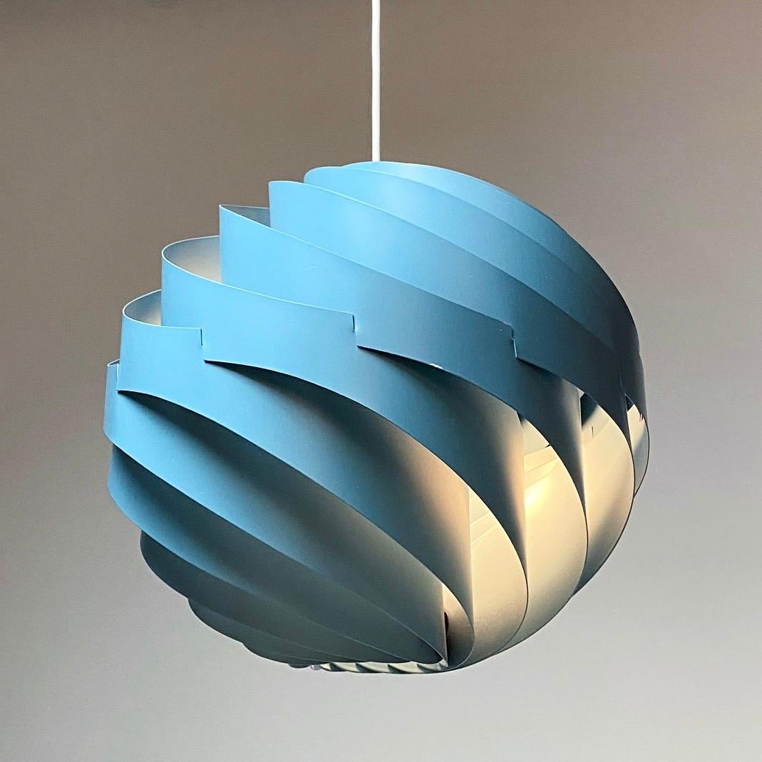 The original turbo ceiling light was made in white, orange and this pink lacquered version in 1967 by Louis Weisdorf for LYFA, Denmark.

Weisdorf is known for some of the most beautiful Danish lighting designs and the turbo is no exception. From