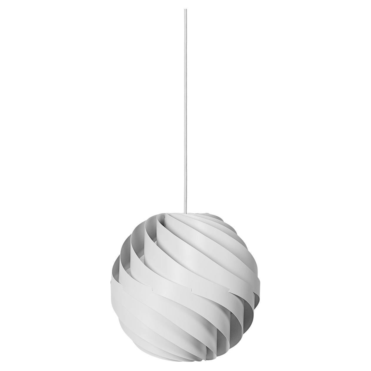 Louis Weisdorf's Turbo Pendant was designed in 1965, but first put into production in 1967 and has achieved great success over the years.

It illustrates design at its best: it is simple in form, yet complex in structure and combines a sense of