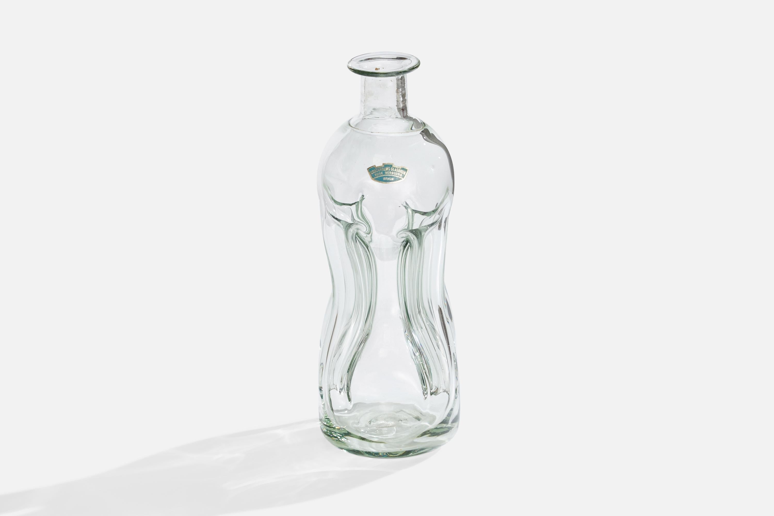 A blown glass bottle designed by Ture Berglund and produced by Skansens Glasbruk, Sweden, 1940s.