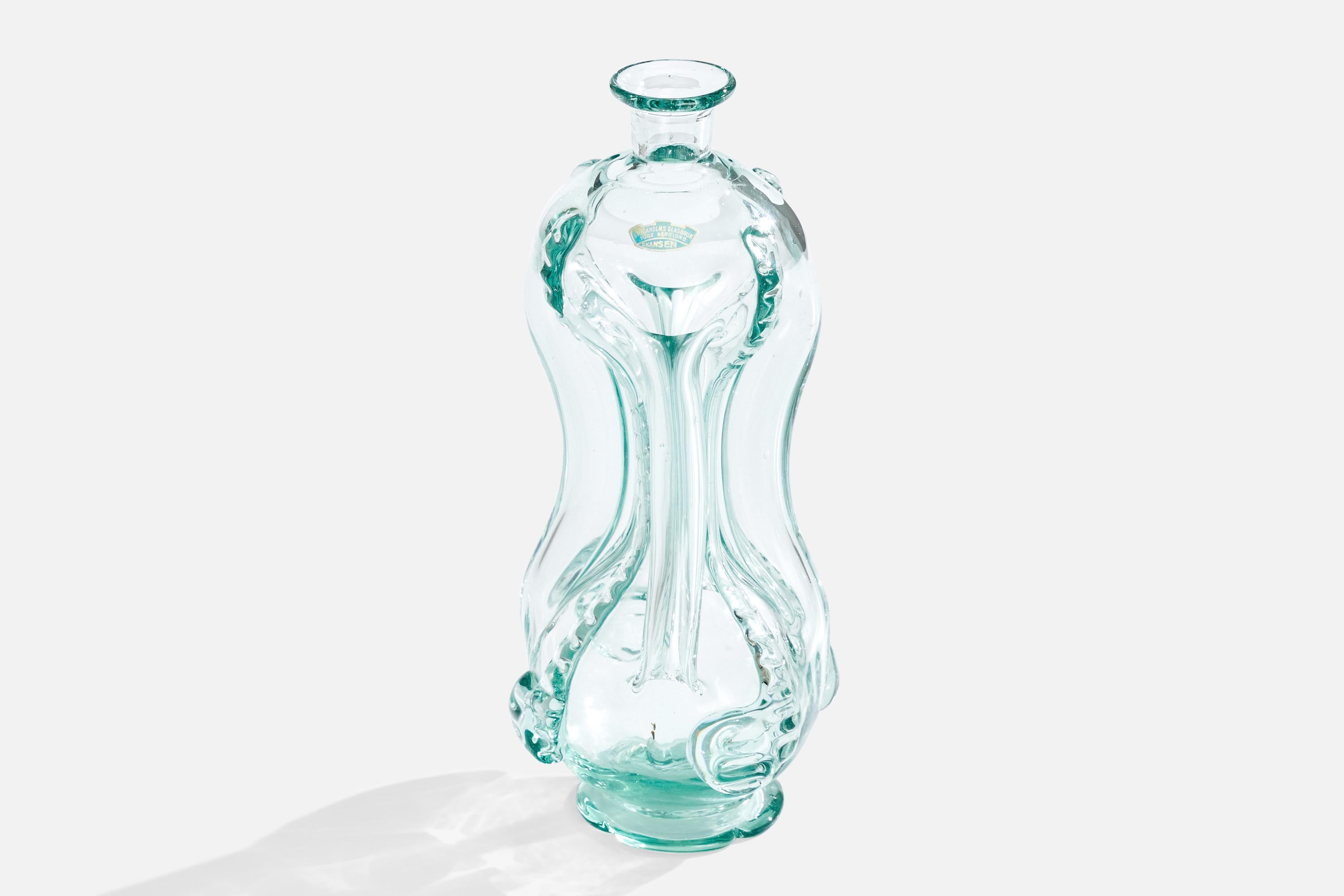 Eine Flasche aus geblasenem Glas, entworfen von Ture Berglund und hergestellt von Skansens Glasbruk, Schweden, 1940er Jahre.