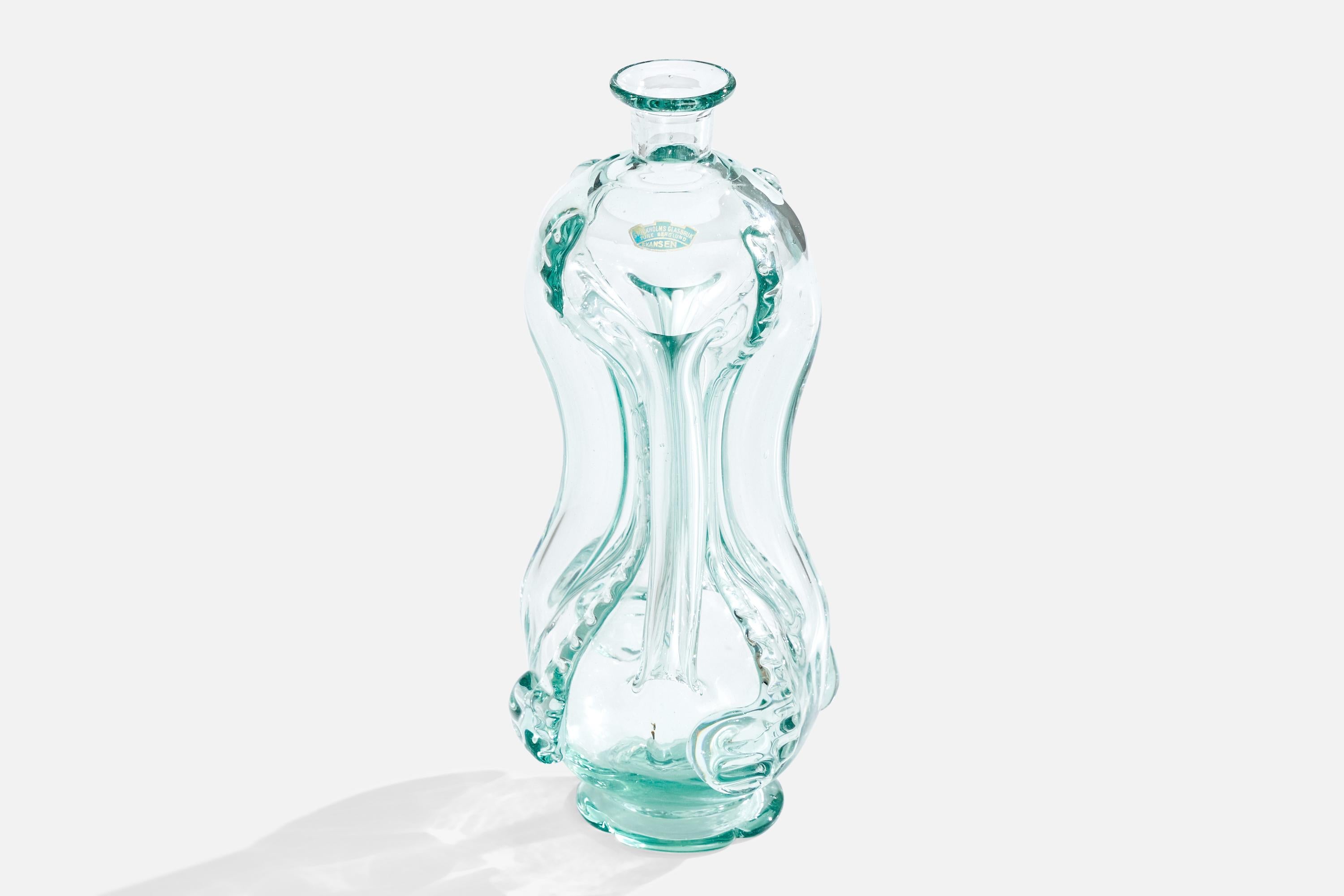 Botella de vidrio soplado diseñada por Ture Berglund y producida por Skansens Glasbruk, Suecia, década de 1940.