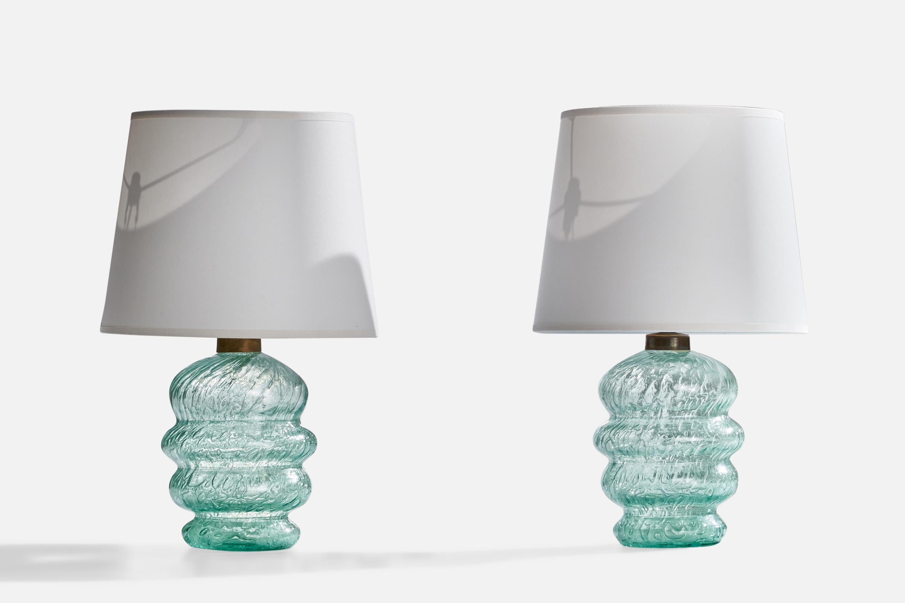 A pair of blown glass and brass table lamps designed by Ture Berglund and produced by Stockholms Glasbruk, Sweden, c. 1940s.

Dimensions of Lamp (inches): 10”  H x 5.5”  Diameter
Dimensions of Shade (inches): 8” Top Diameter x 10”  Bottom Diameter x