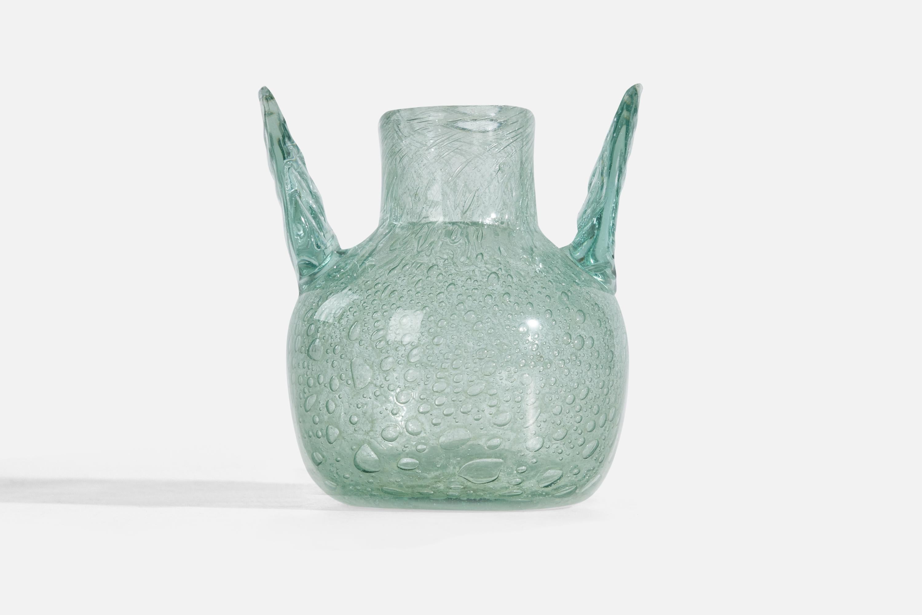 A green glass vase designed by Ture Berglund and produced by Skansen Glas, 1940s.

