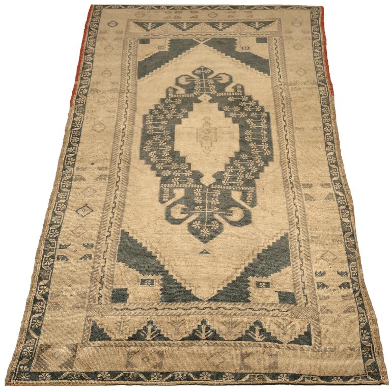 Traditional Turkish Wool Area Rug with Medallion Design

This extraordinary rug commands attention with its vibrant, intricate grandeur and a compelling central medallion. Its refined palette and meticulous detailing create an unyielding foundation