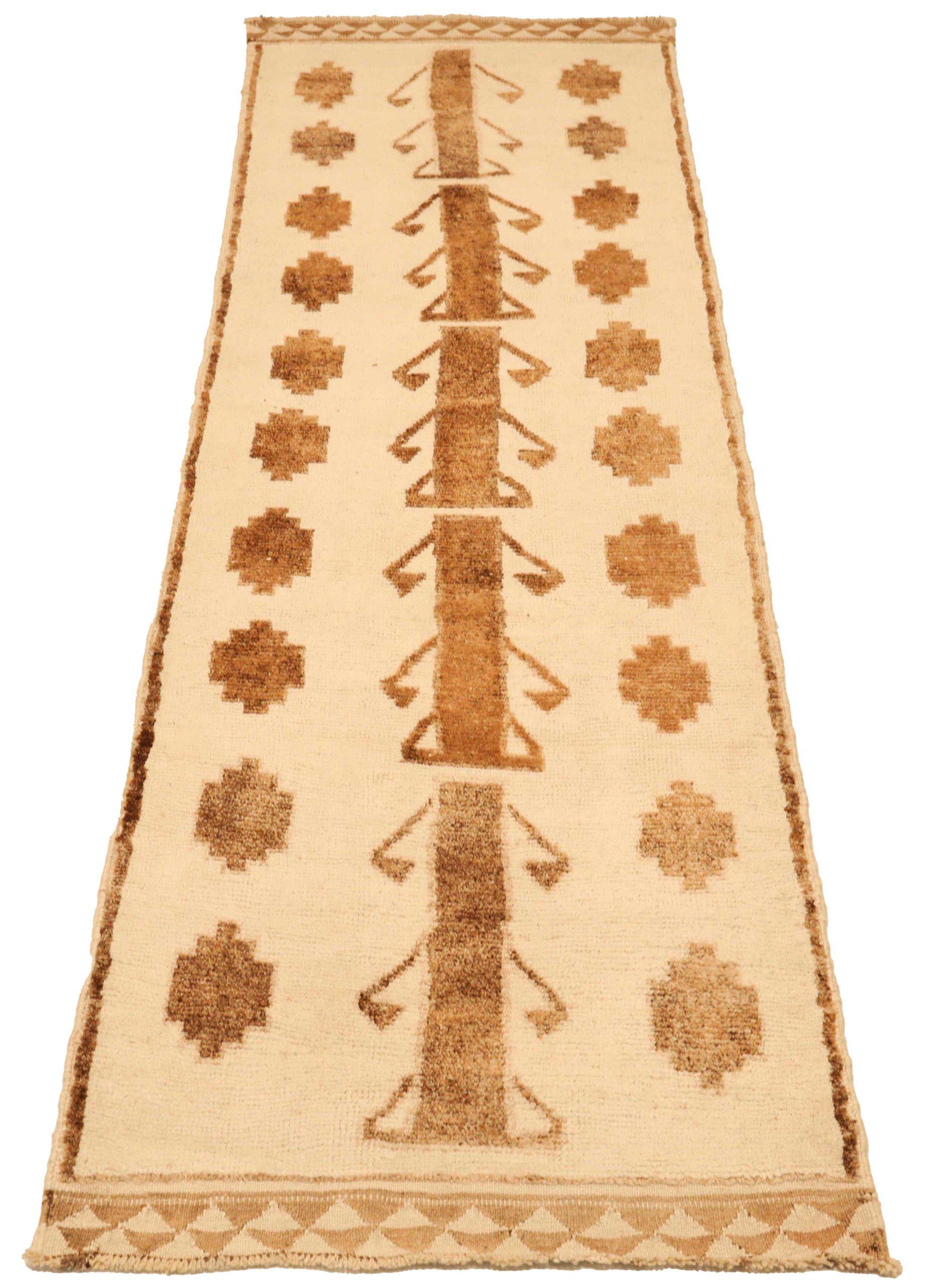 Découvrez l'élégance du tapis de Turquie Anatoly, qui présente un chemin de roulement de Circa 1940. Conçu avec de la laine et du Design/One, ce design exclusif est parfait pour mettre en valeur votre espace.