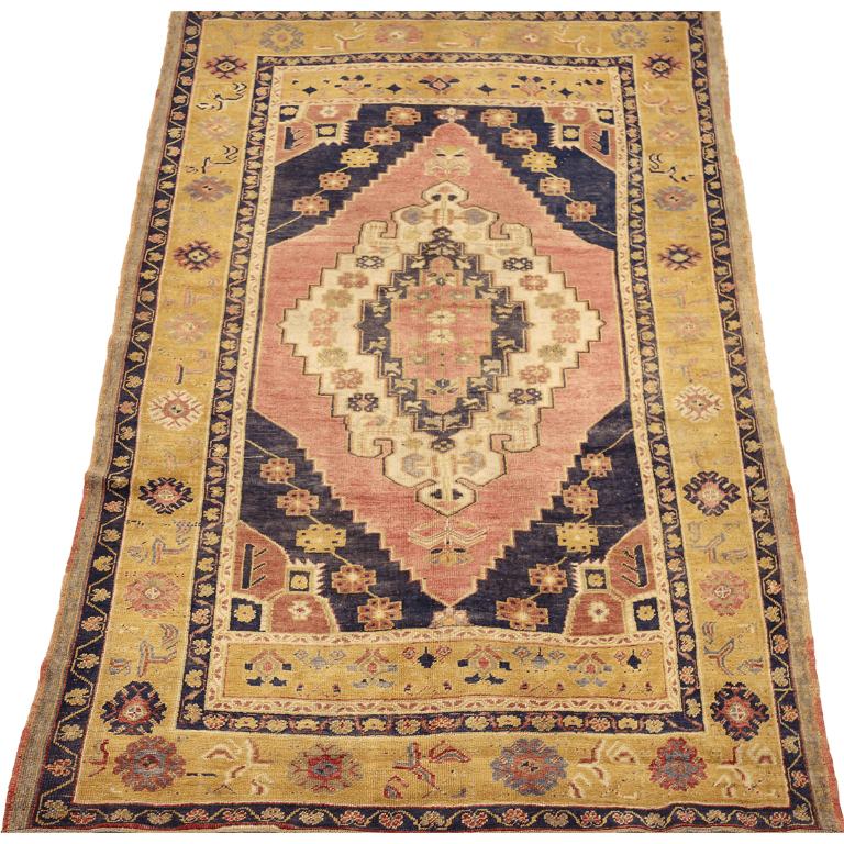Turkish Anatoly Rug: Yellow, Pink & Blue Medallion

A Field of Radiant Hues and Commanding Design
This captivating Turkish Anatoly small rug immediately draws the eye. Its expansive field, in a vibrant golden yellow, provides a powerful backdrop for