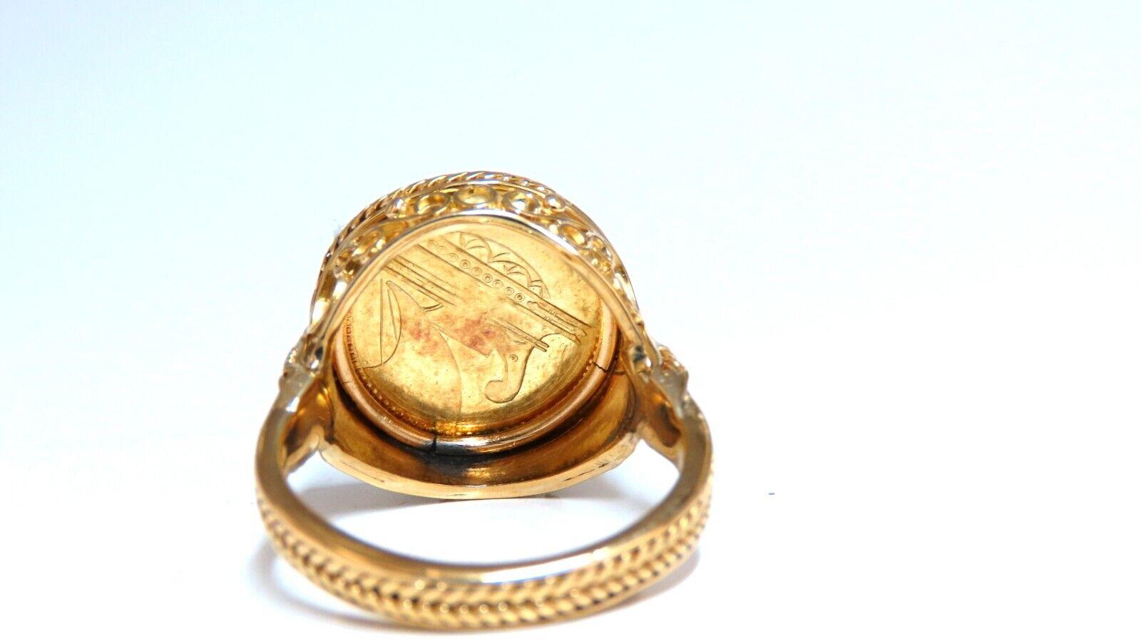Turkey coin ring

18kt yellow gold

7.7 grams

Deck: 17 x 17mm

Depth: 5mm