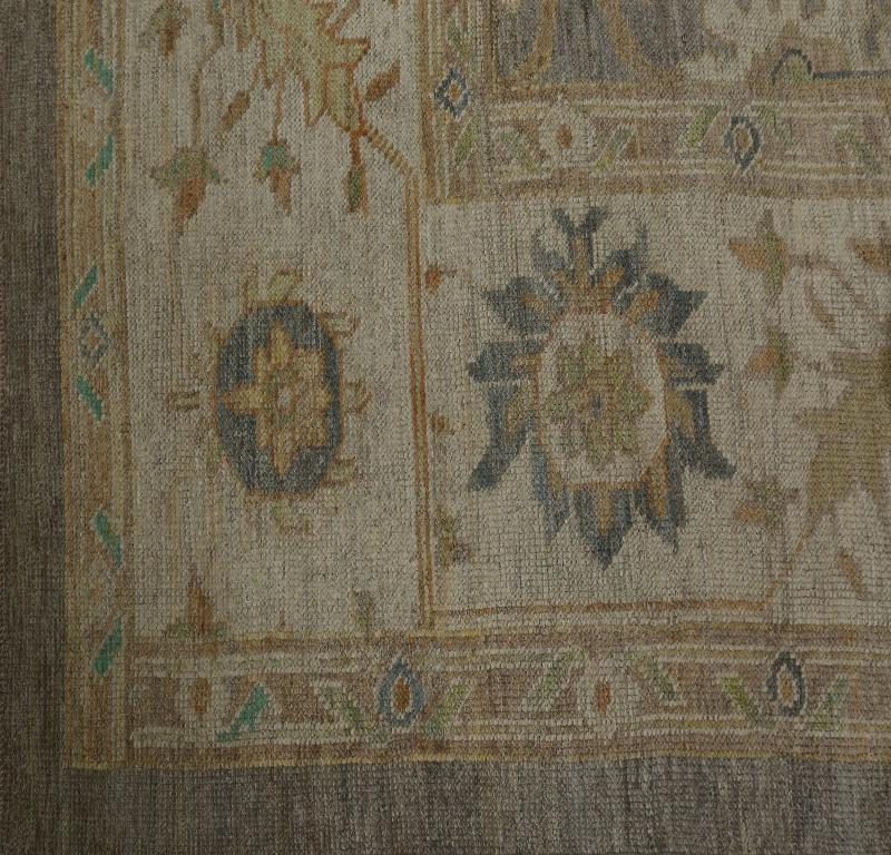 An Exquisite Traditional Oushak Wool Area Rug

Visual Aesthetics & Ornate Oushak Design
A Symphony of Muted Elegance
Step into a world of timeless sophistication with this magnificent Oushak Area Rug. Its primary palette is a symphony of muted grey
