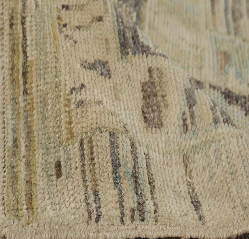 Understated Elegance: Turkish Oushak Area Rug (146 x 185 Inches)
Discover the serene beauty and enduring charm of our Turkish Oushak Area Rug, a testament to generations of masterful craftsmanship. Originating from the rich weaving heritage of