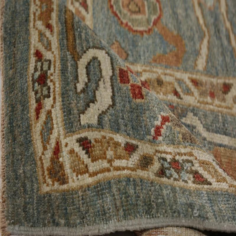 Azure & Amber: A Distinctive Turkish Sultanabad Rug

Unveiling a Masterful Turkish Sultanabad
Discover the profound beauty of this masterful hand-knotted Sultanabad area rug, a true treasure from Turkey. Its rich, harmonious palette and intricate
