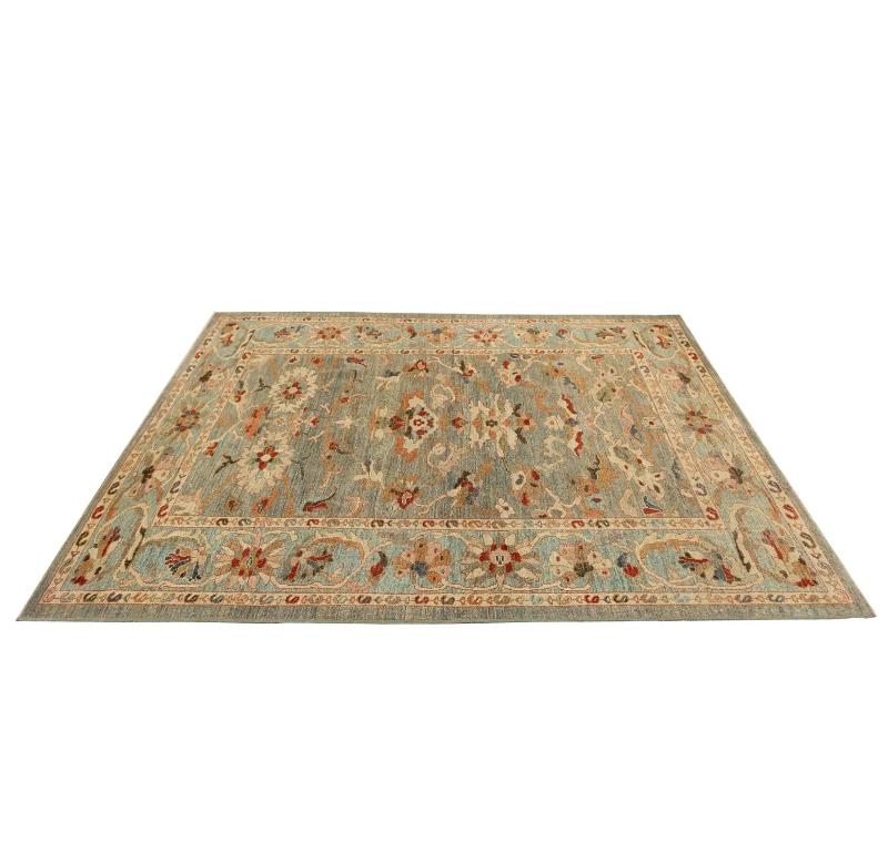 Timeless Flourish: A Turkish Sultanabad Area Rug
This magnificent wool area rug, measuring 6 ft 7 in x 9 ft 3 in, is a superb example of celebrated Turkish Sultanabad craftsmanship. Designed in a truly traditional style, its plush surface unfolds a