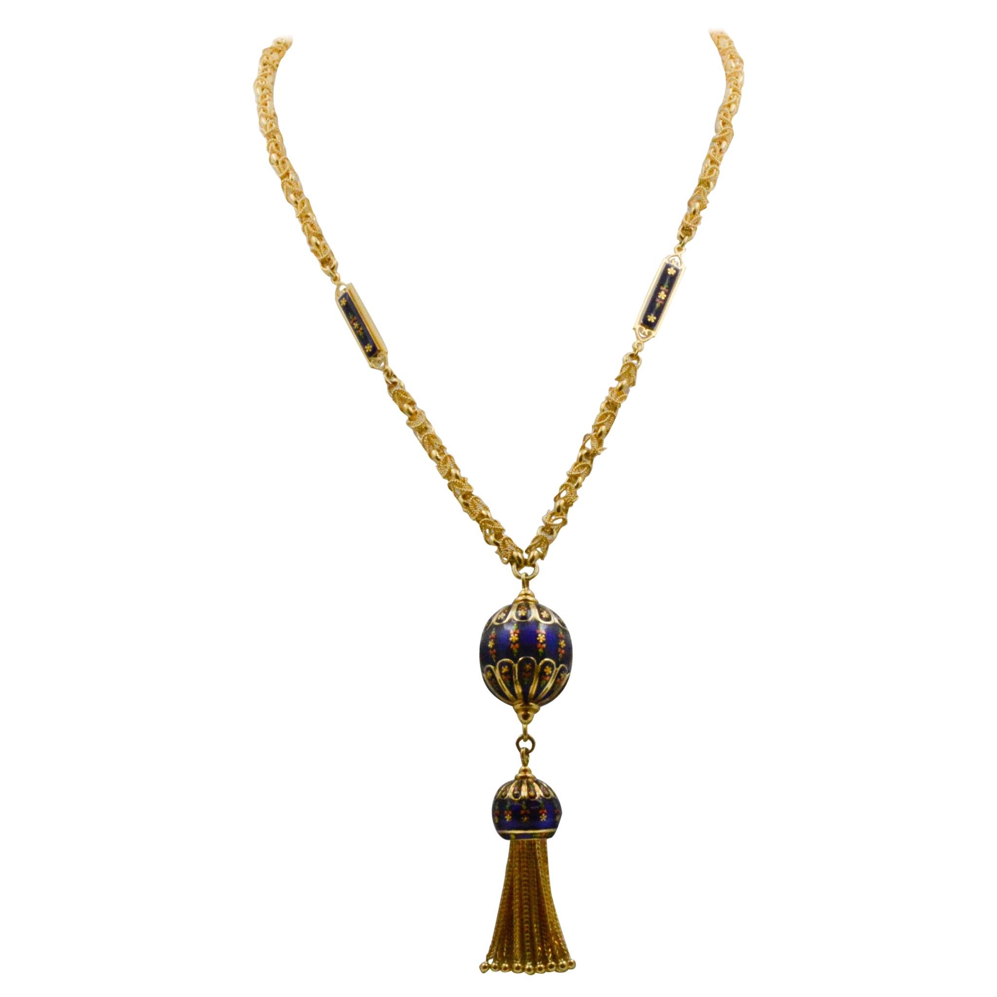 Exclusively from our Eiseman Estate Jewelry Collection, this 18k yellow gold Turkish necklace chain features six blue floral enamel stations with a tassel at the end. The necklace measures at 34” long and 4.75mm in diameter.