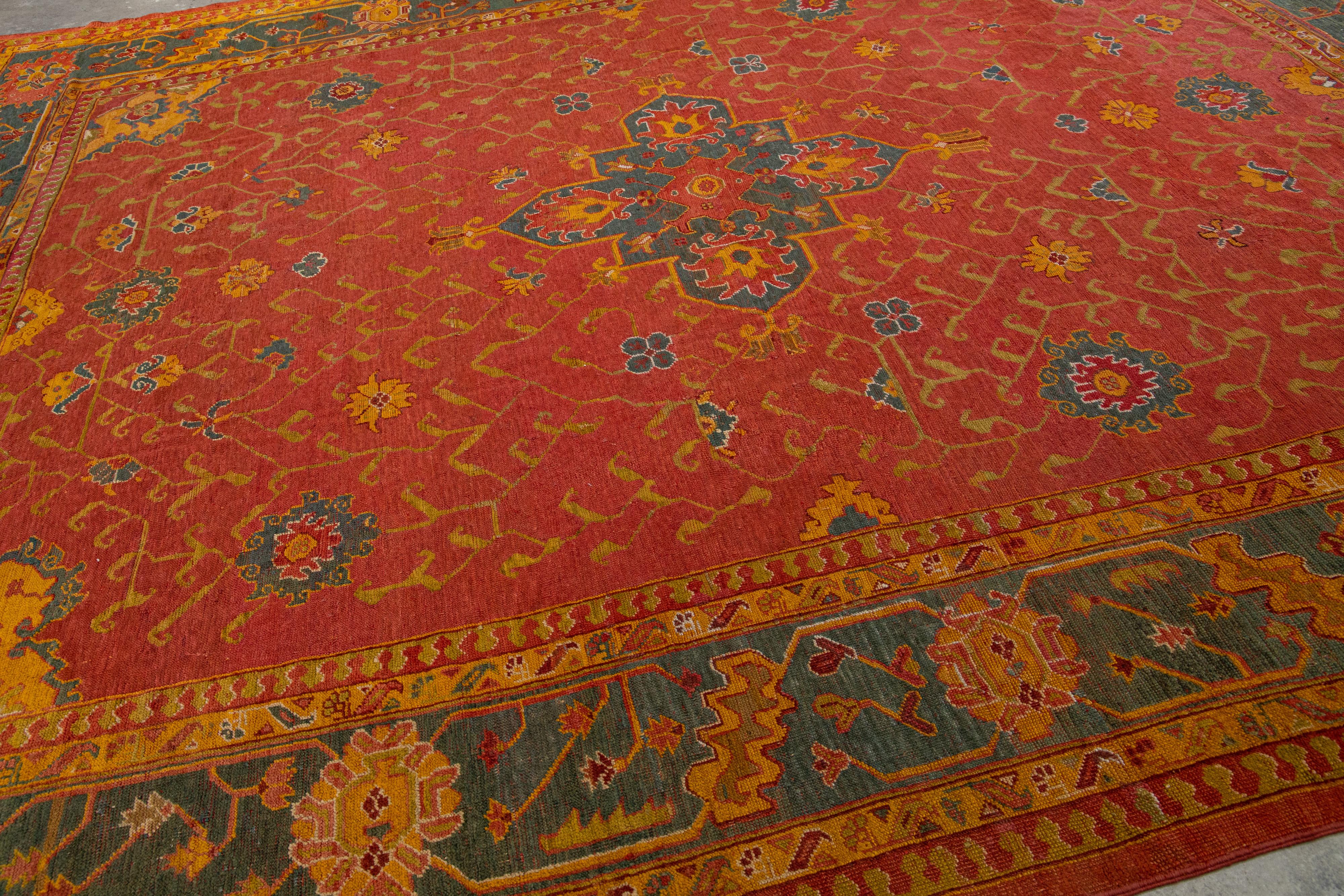 Hand-Knotted Turkish 1880s Oushak Red Wool Rug Handmade with Allover Floral Motif For Sale