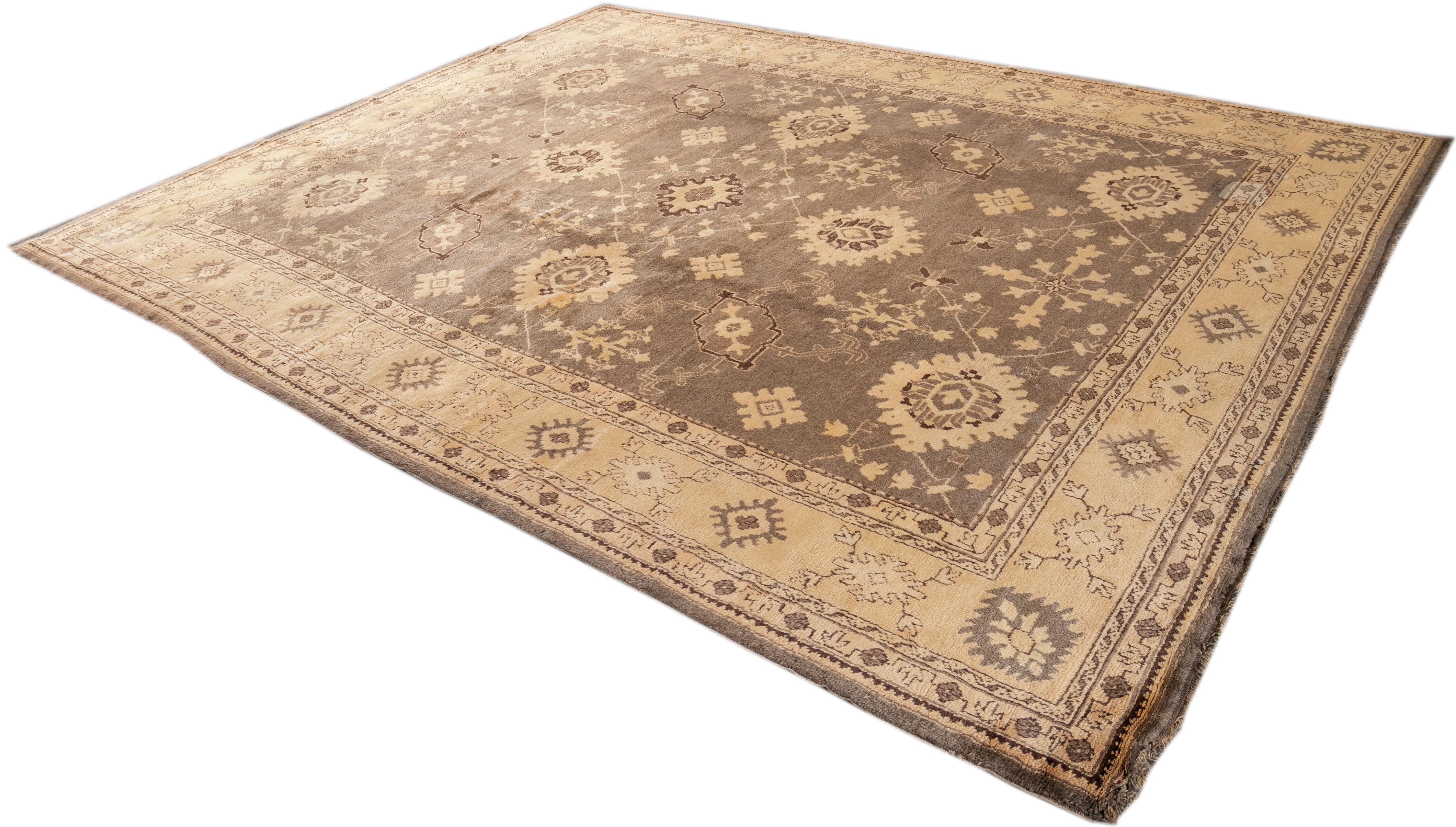 Hand-Knotted Turkish 1900s Oushak Gray Wool Rug Handmade with Allover Floral Motif For Sale