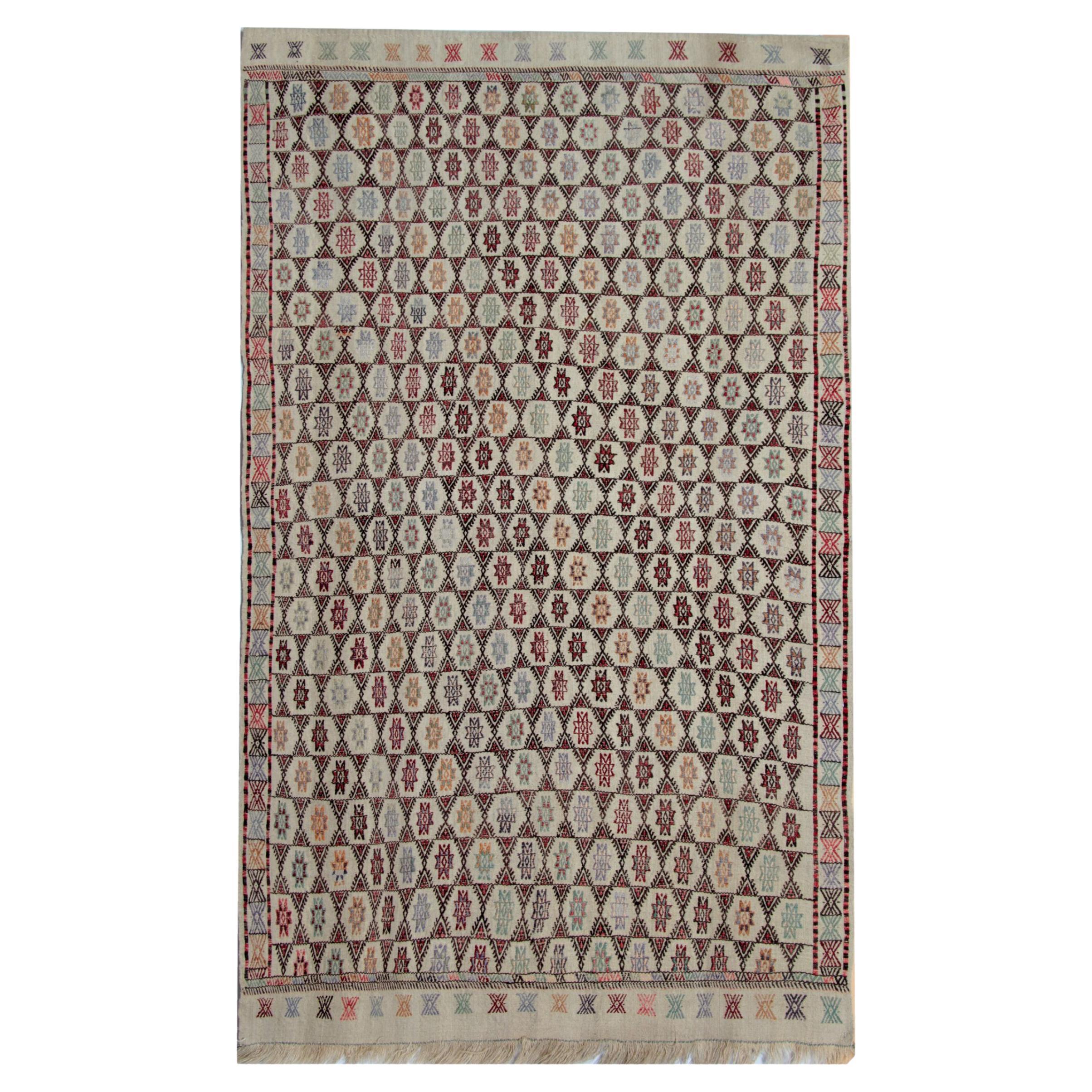 Kilim turco con motivo a stella del 1910, tappeto geometrico in lana beige fatto a mano in vendita