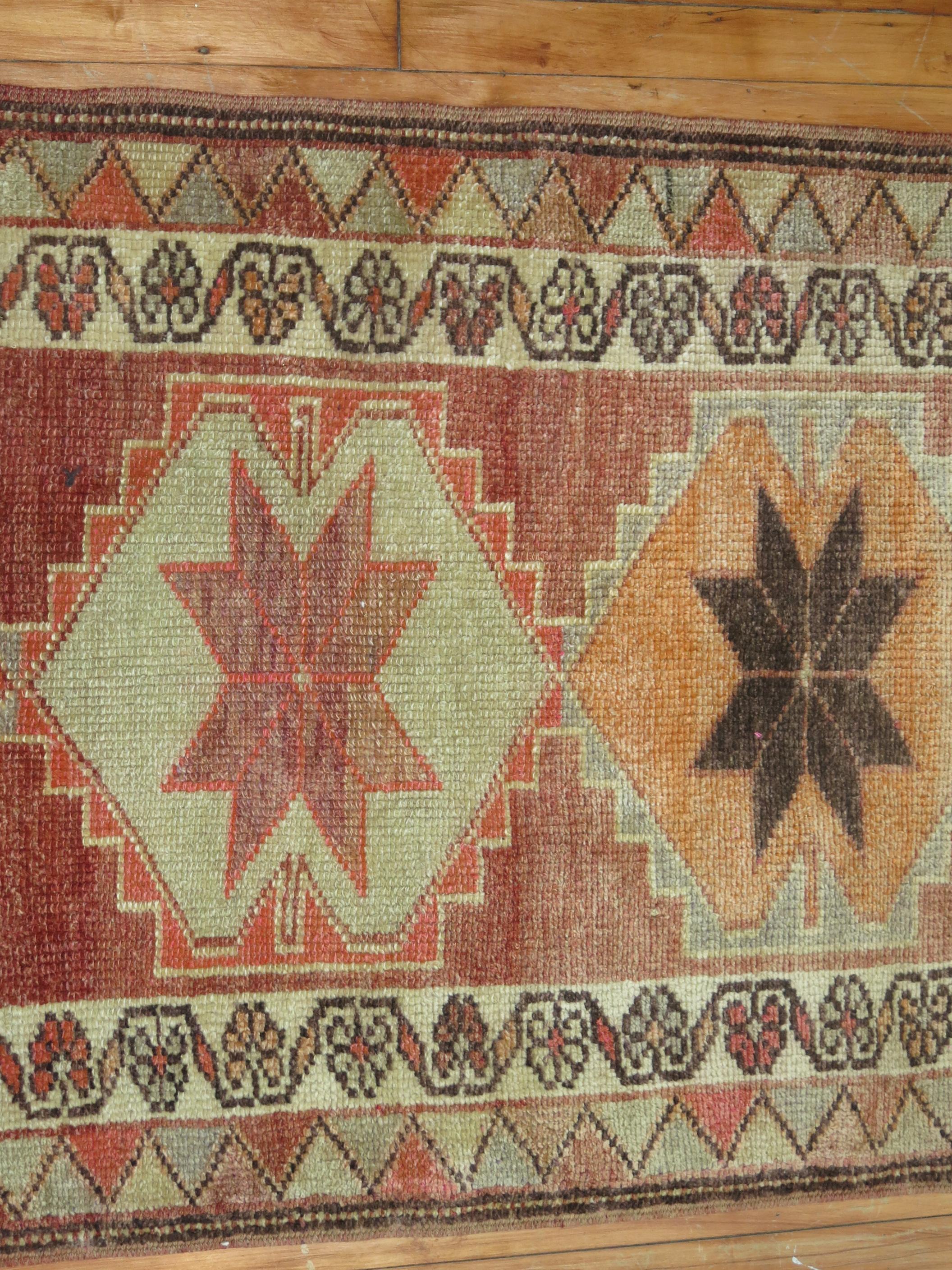 A mid-20th-century Turkish geometric runner in earth tones

Measures: 2'10