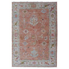 Turkish Angora Oushak Rug in Terracotta with Light Blue, Ivory 
Green5
11 x 9
0