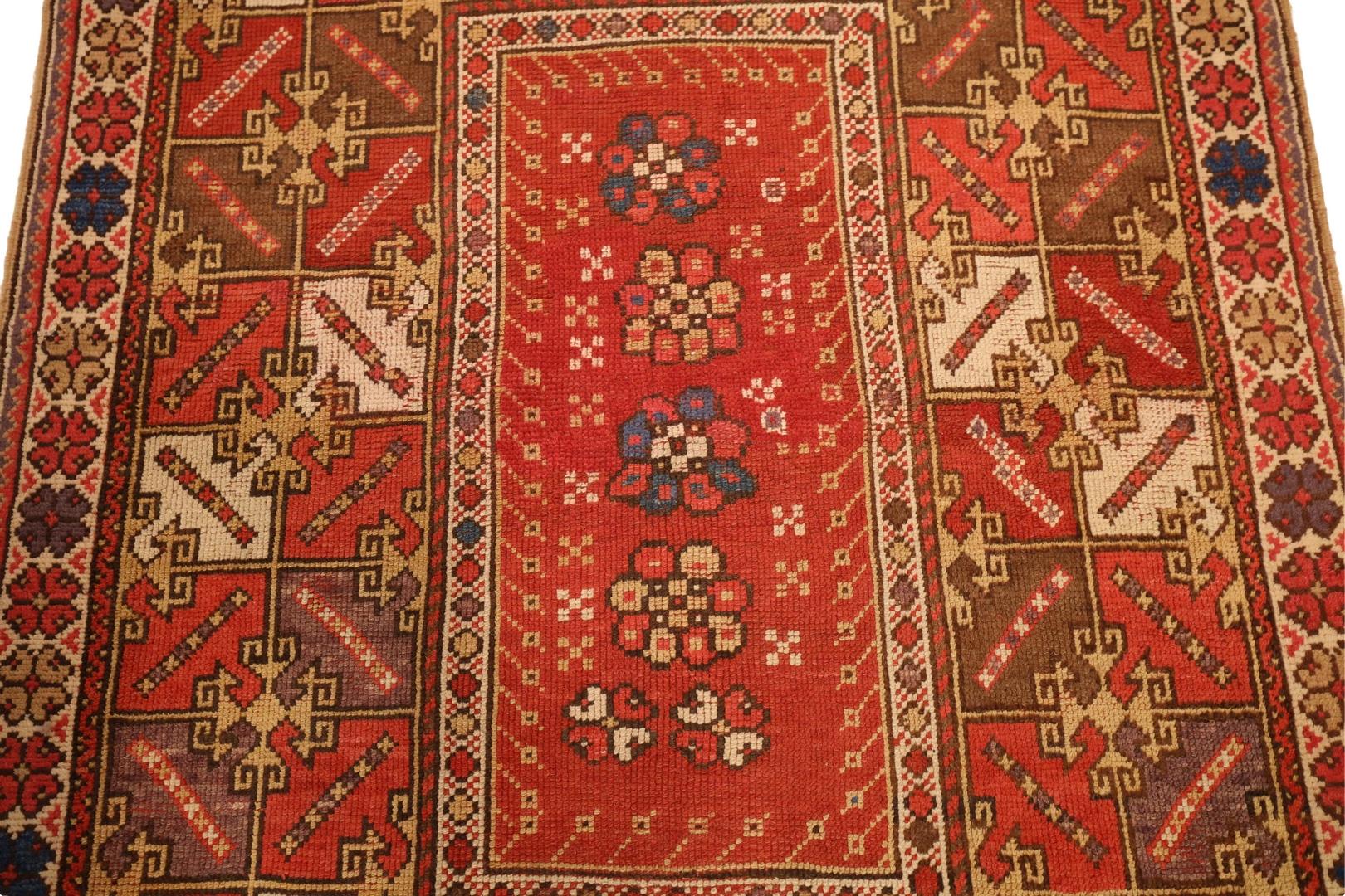 This antique Turkish rug is a true masterpiece that captures the essence of traditional weaving techniques and the rich cultural heritage of the region. The rug's beautiful color red has aged gracefully over time, giving it a unique and charming