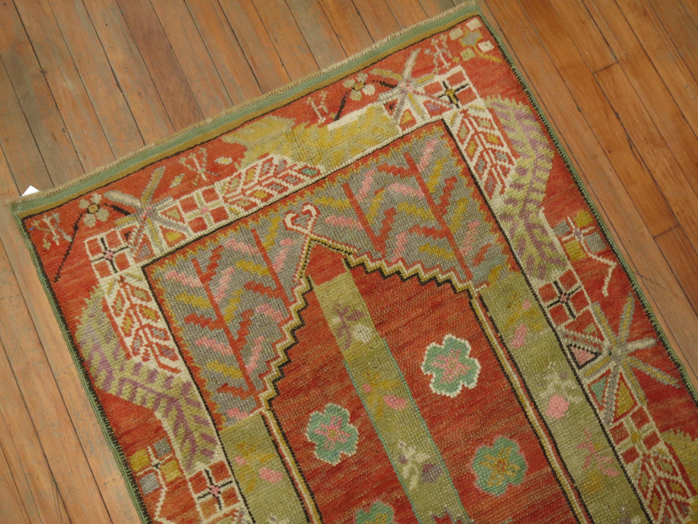 A one of a kind Turkish scatter size throw rug from the early 20th century.