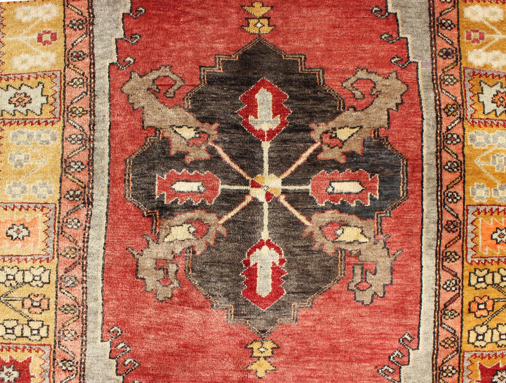 20th Century Turkish Antique Tribal Diamond Medallion Oushak Area Rug in Red and Gold For Sale