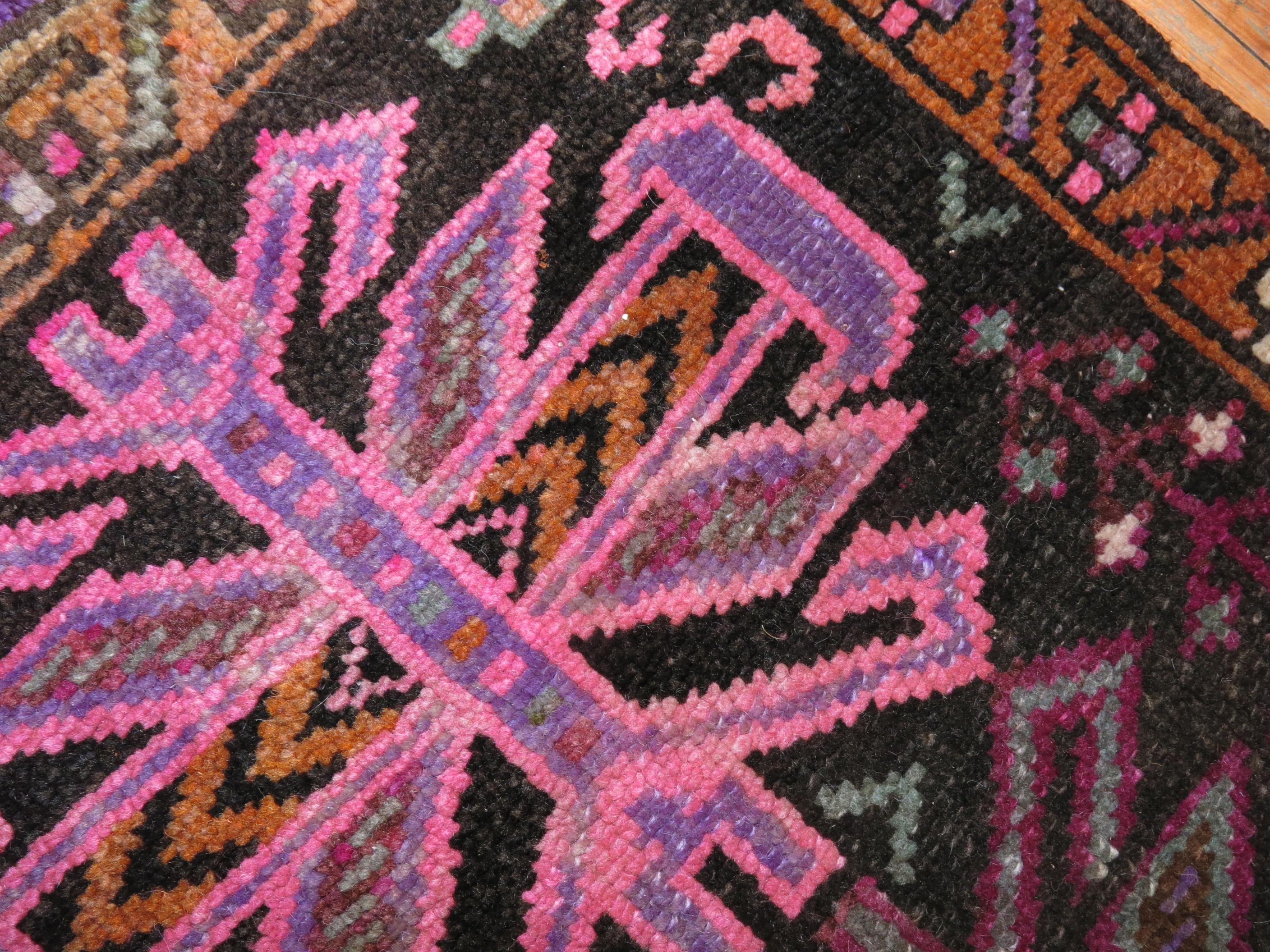 One of a kind vintage Turkish rug in brown pink and purple

1'9'' x 2'10''