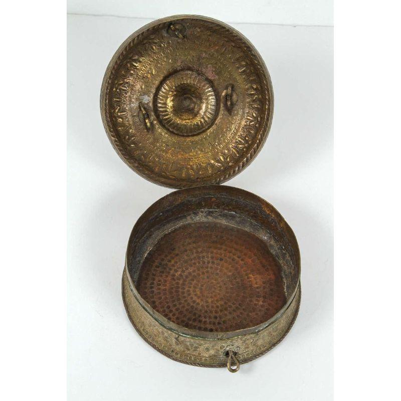 Beautiful antique brass hand-hammered Turkish round box with lid.
Nicely hand-hammered with intricate details.
Please check photo #5, there is about 1 inch damage area on the side of the box.
Museum quality treasure box.
Hand-hammered decorative