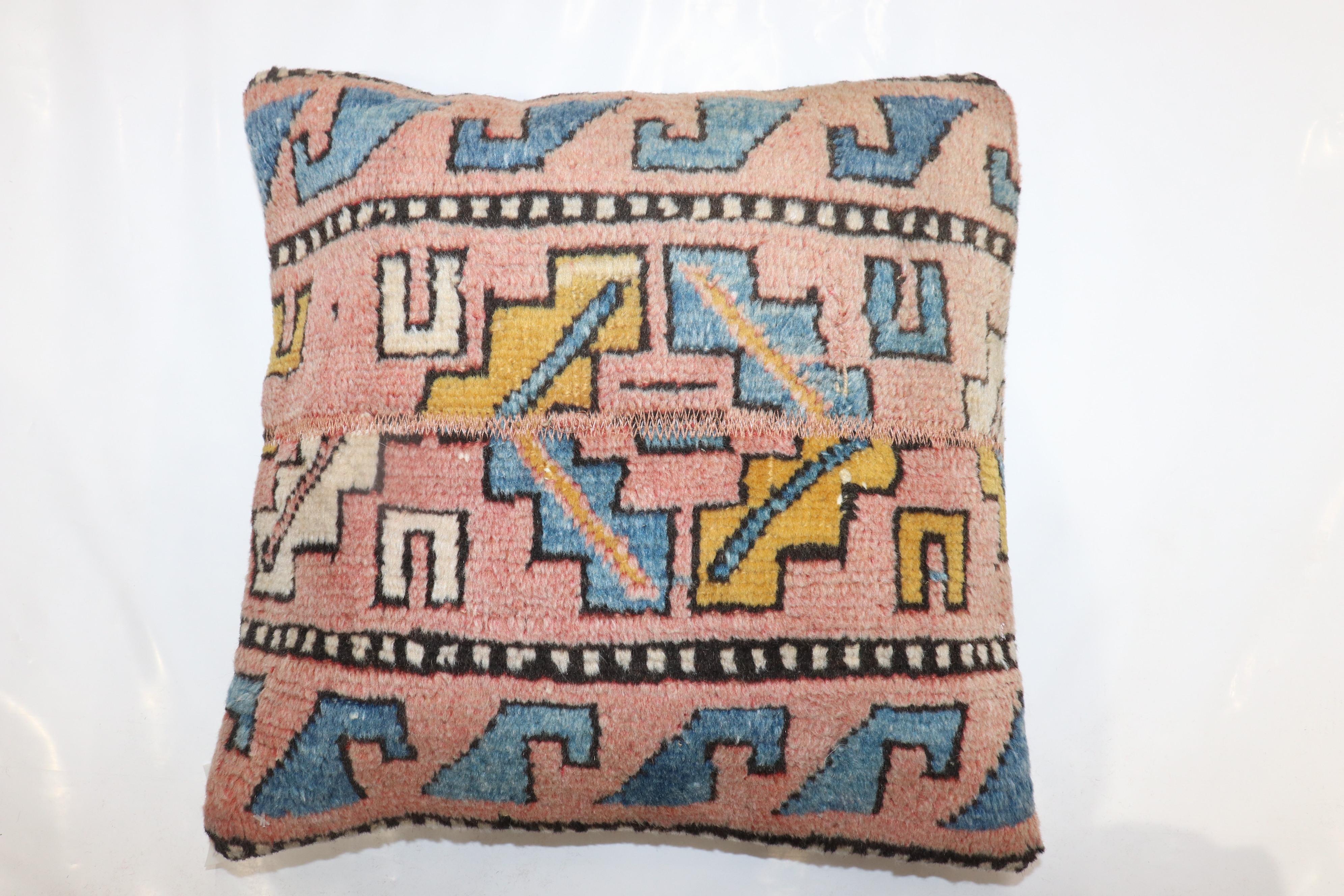 Pillow made from a border of a Turkish Deco rug.

Measures: 16'' x 16''.