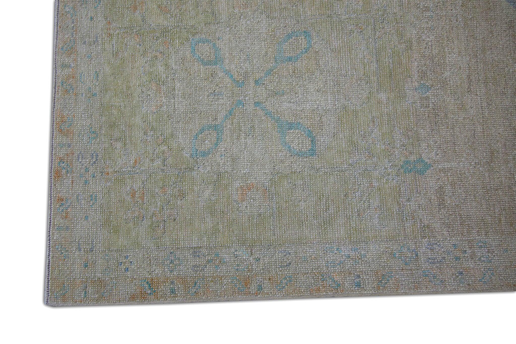 This Turkish finewoven oushak rug is a stunning piece of art that has been handwoven using traditional techniques by skilled artisans. The rug features intricate patterns and a soft color palette that is achieved through the use of natural vegetable