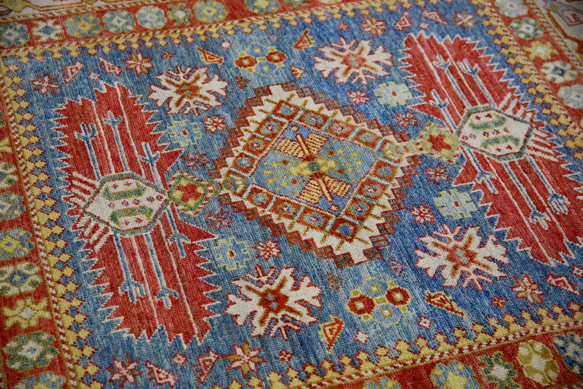 This modern finewoven Turkish Oushak rug is a stunning piece of art that has been handwoven using traditional techniques by skilled artisans. The rug features intricate patterns and a soft color palette that is achieved through the use of natural