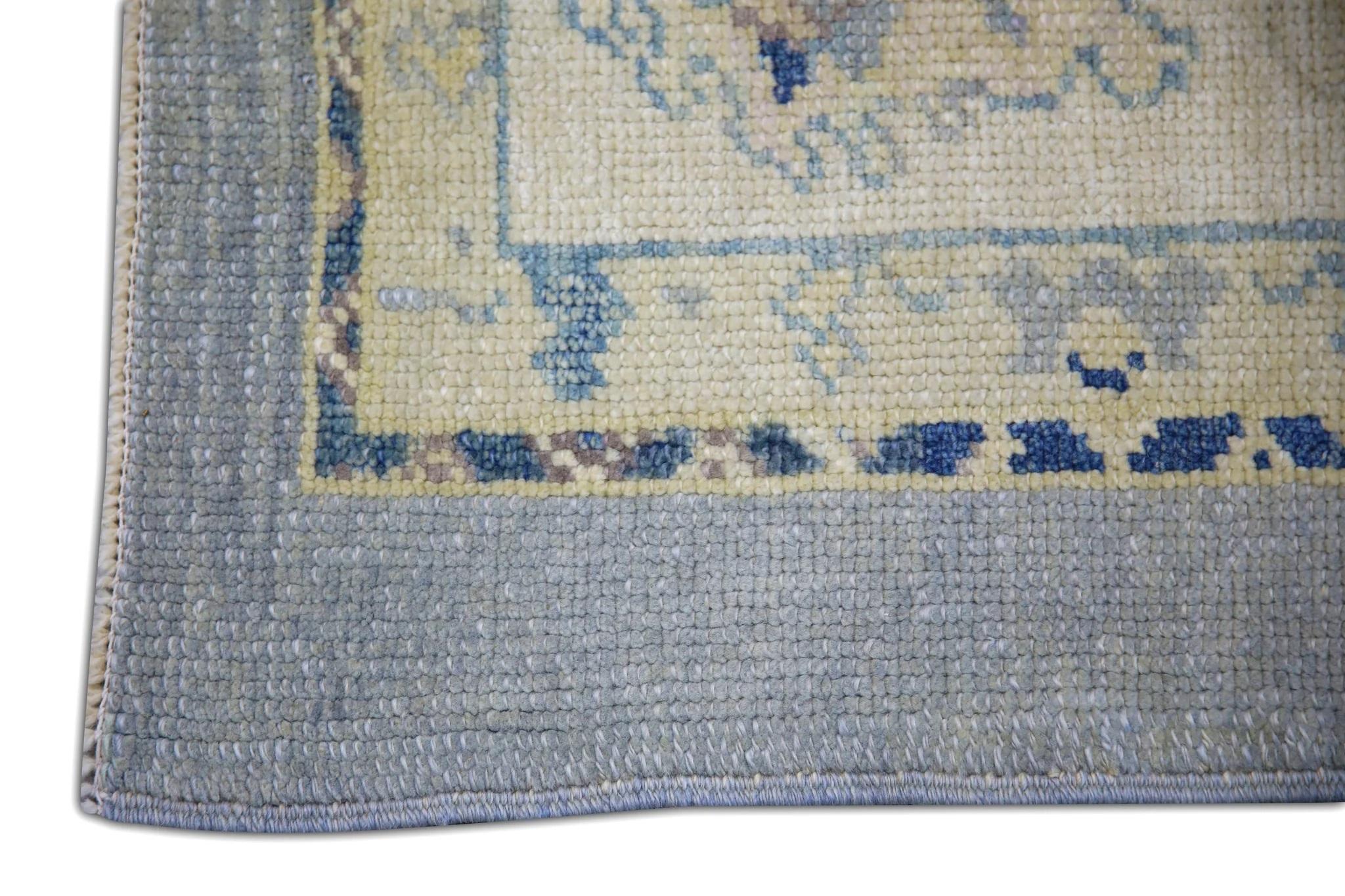 Vegetable Dyed Handwoven Wool Floral Turkish Oushak Rug in Shades of Blue 9' x 10'6