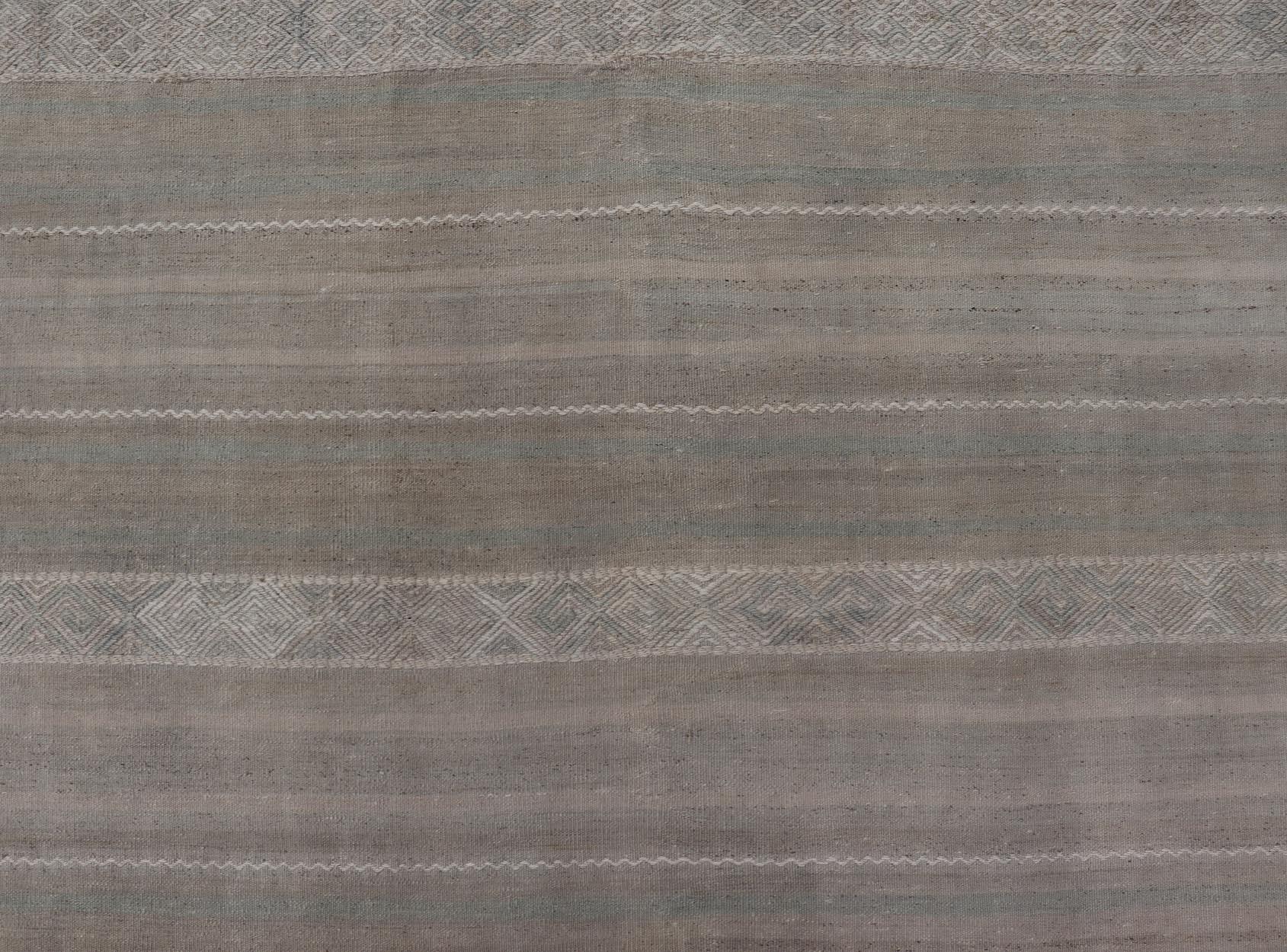 Hand-Woven Turkish Flat-Weave Kilim in Muted Colors with Stripes and Embroideries For Sale