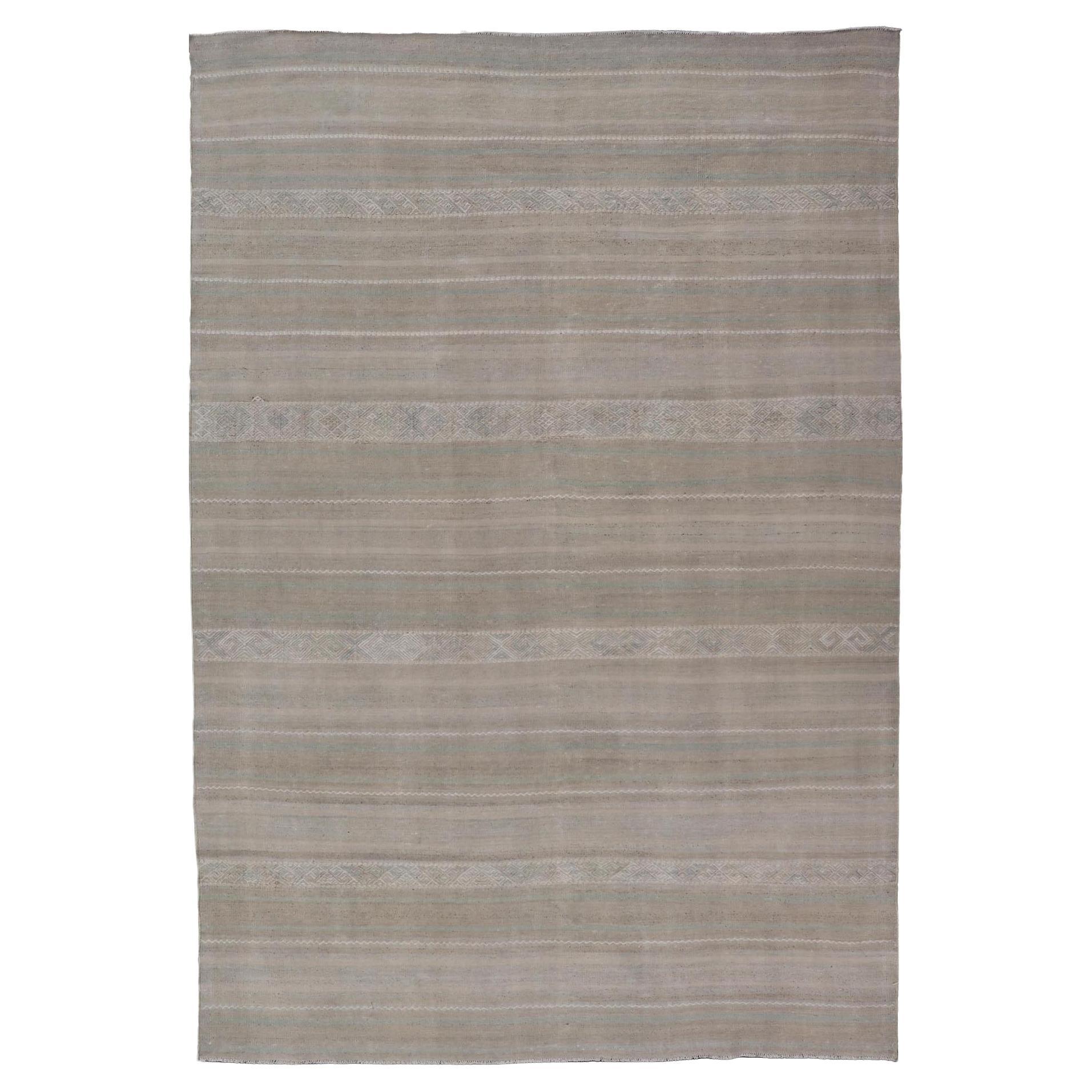 Turkish Flat-Weave Kilim in Muted Colors with Stripes and Embroideries For Sale