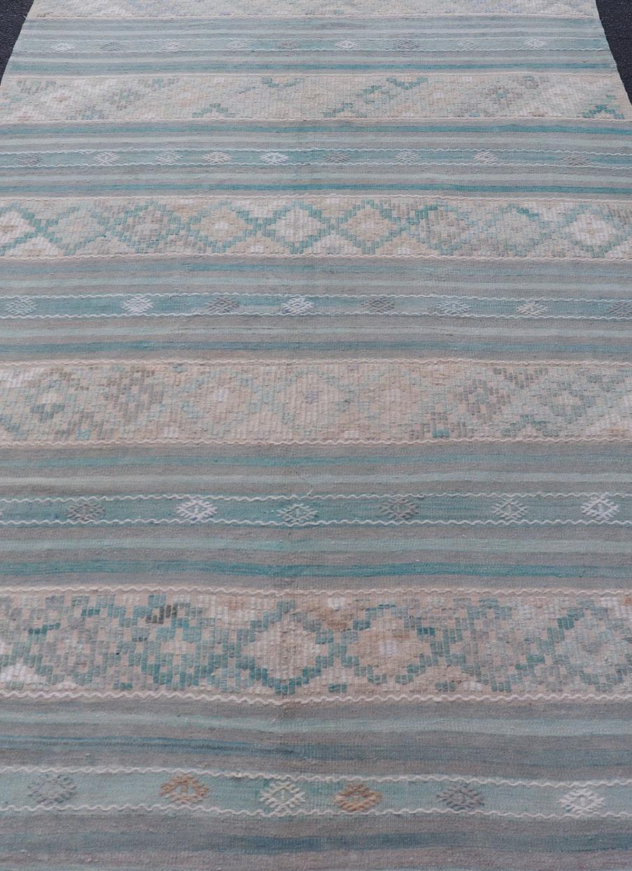 Turkish Striped Kilim vintage carpet in light taupe, green, light blue, gray, tan, and cream. Keivan Woven Arts / rug EN-179749, country of origin / type: Turkey / Kilim, circa 1950

Measures: 6 x 11'1.