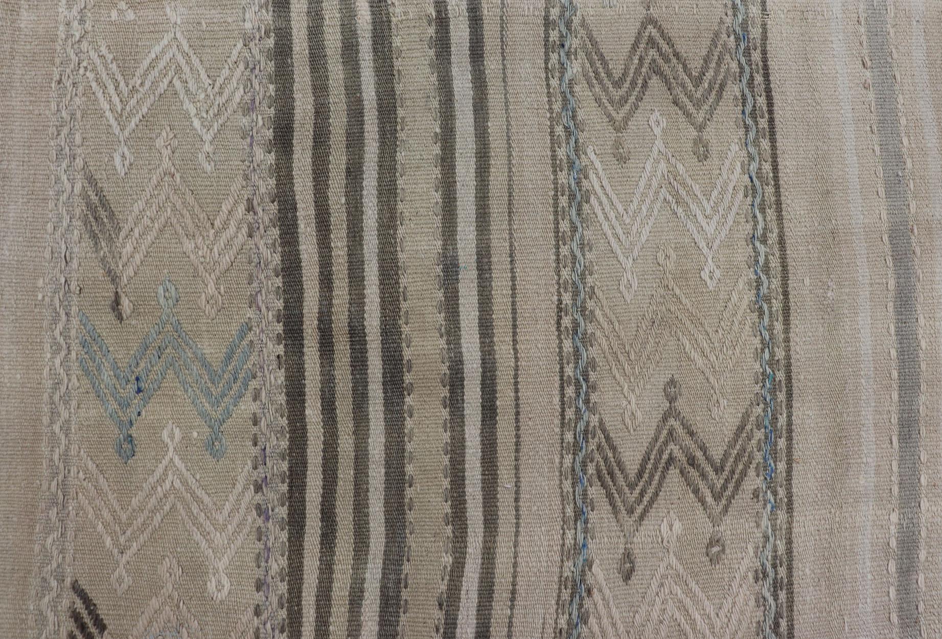 Vintage flat-weave Kilim with embroideries in tan, blue-gray with a modern design geometric stripe design Vintage Kilim from Turkey. Keivan Woven Arts /  rug EN-179491, country of origin / type: Turkey / Kilim, circa 1950
Measures:4'6 x 6'7 
This