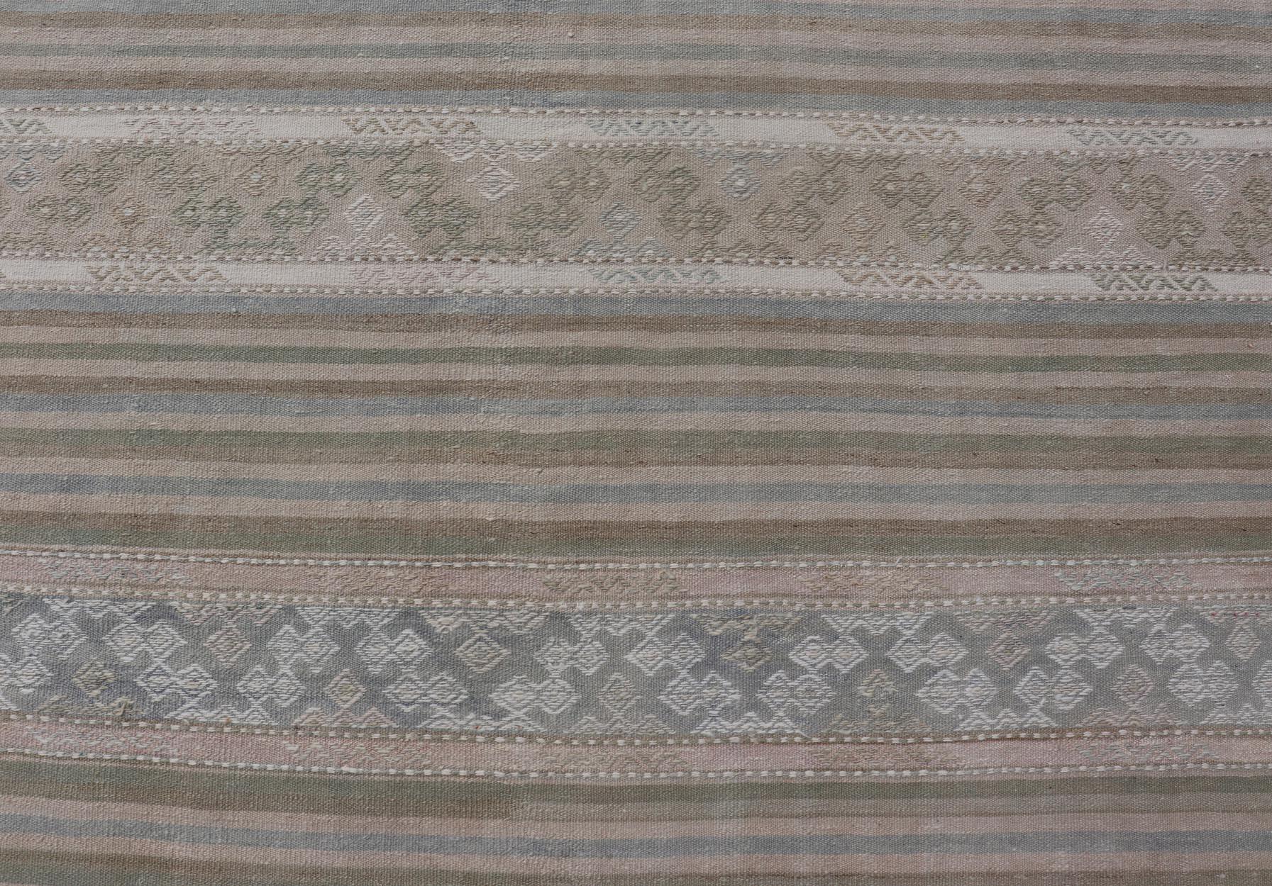 20th Century Turkish Gallery Flat-Weave Kilim in Muted Colors with Stripes and Embroideries For Sale