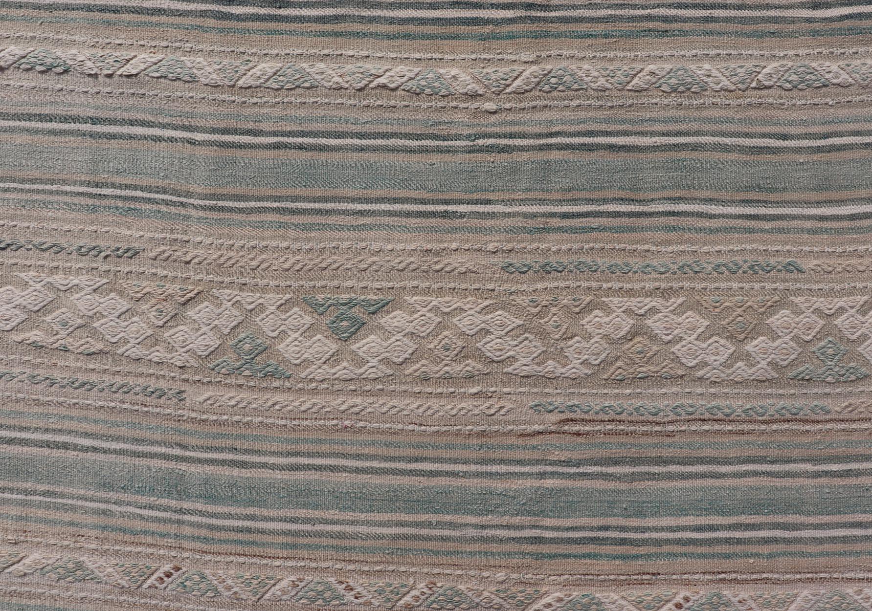 Wool Turkish Gallery Flat-Weave Kilim in Muted Colors with Stripes and Embroideries For Sale