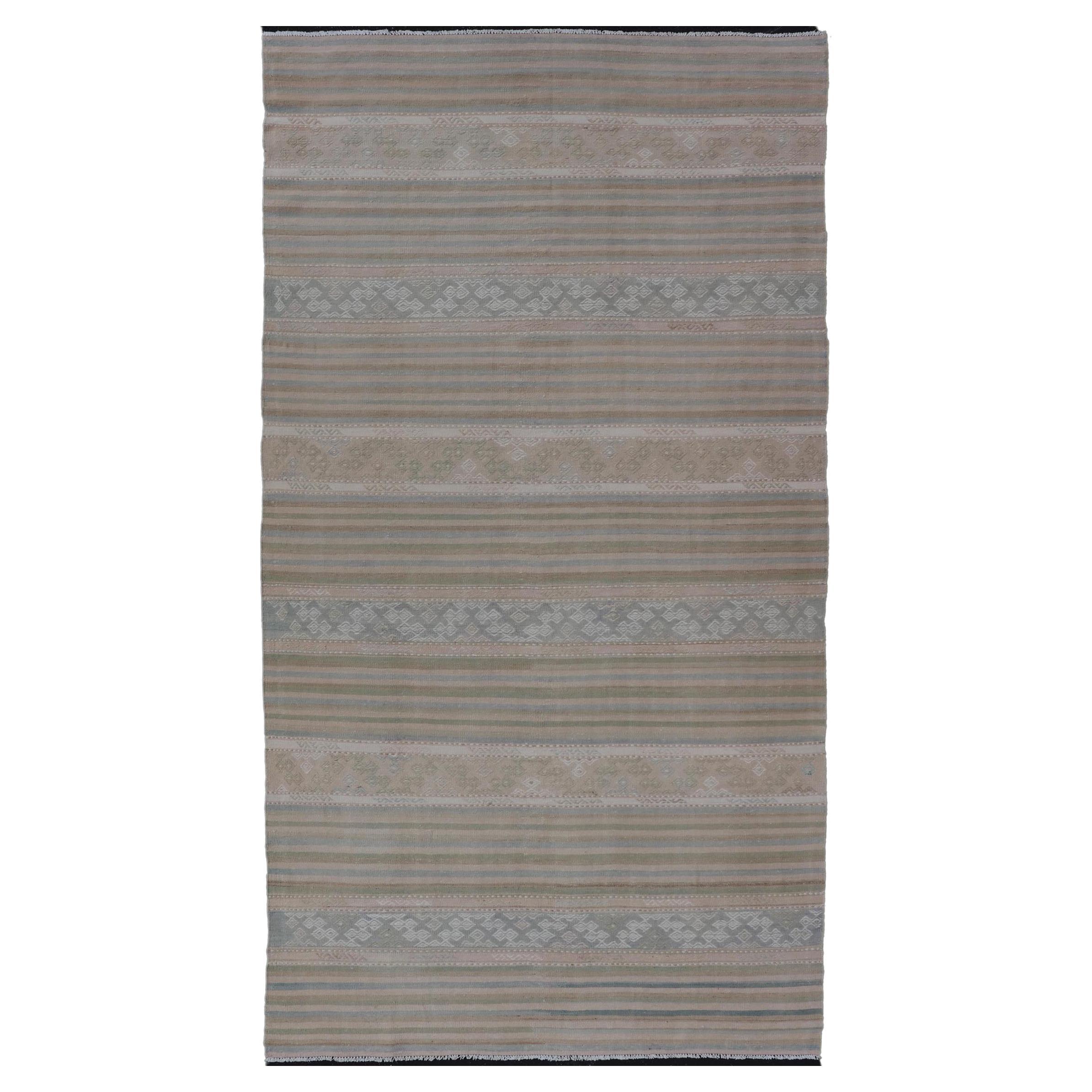 Turkish Gallery Flat-Weave Kilim in Muted Colors with Stripes and Embroideries For Sale