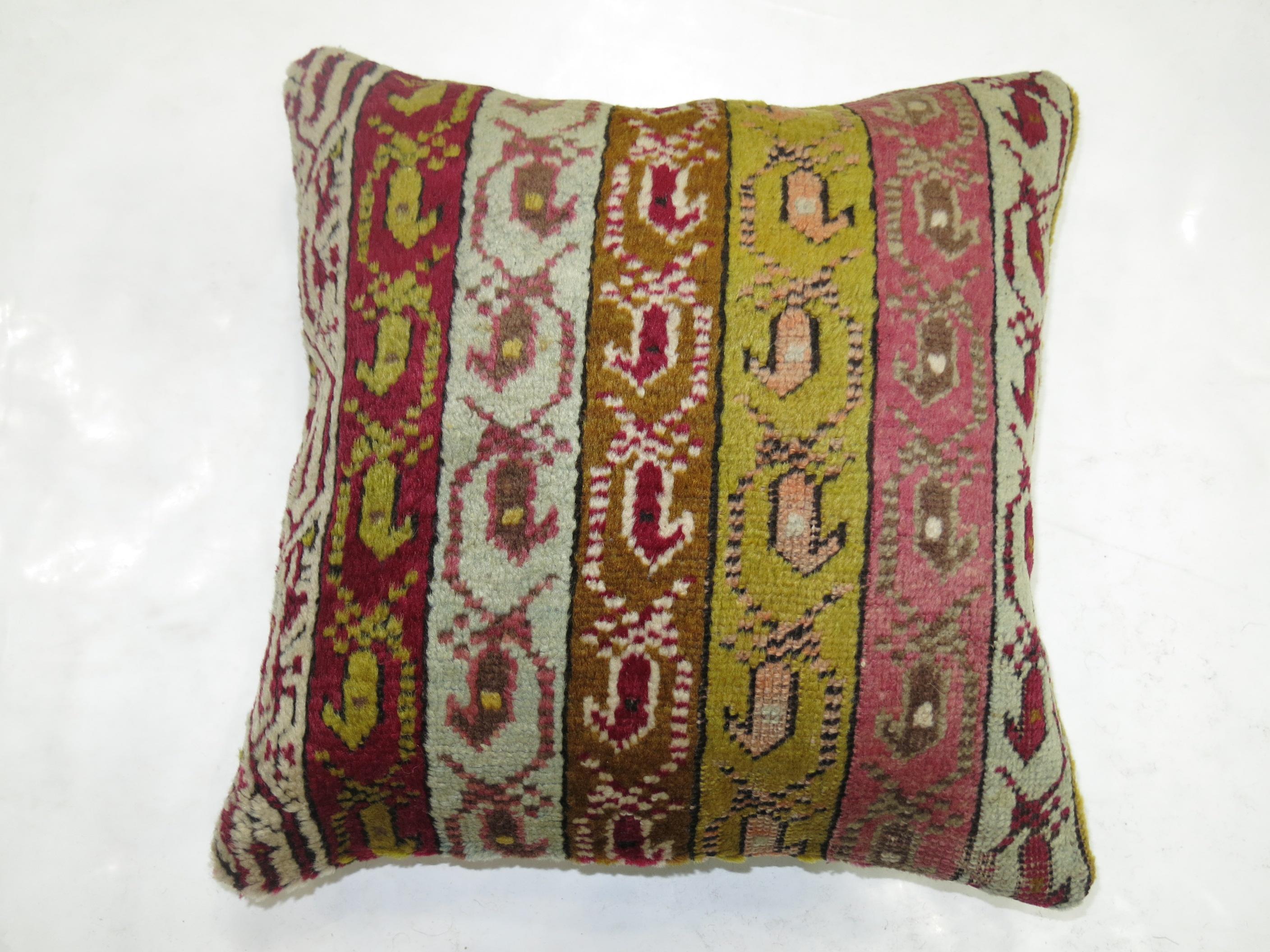 Pillow made from an early 20th century Turkish ghiordes rug.