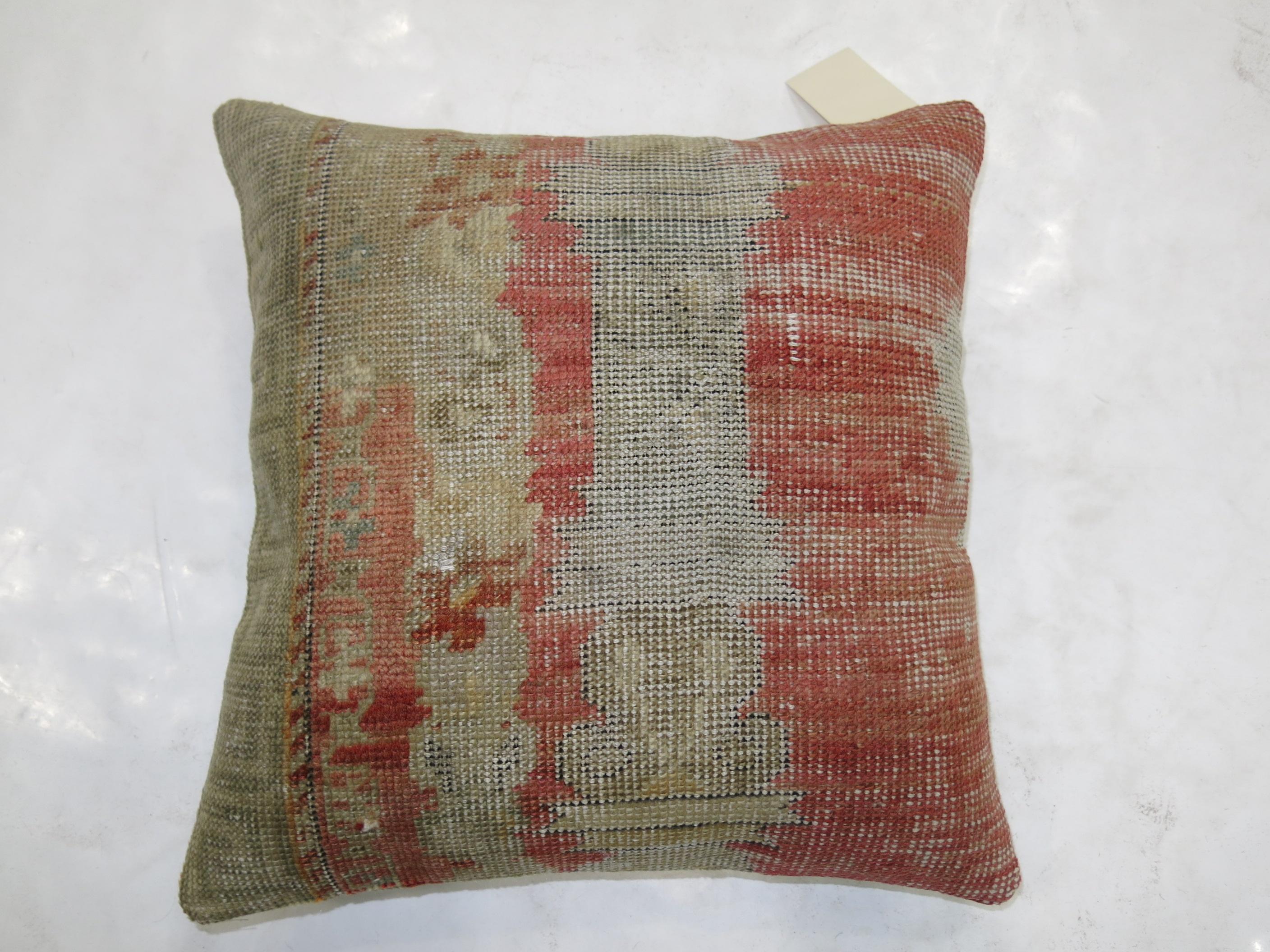 Pillow made from a late 19th century Turkish Ghiordes Prayer rug. zipper closure and poly-fill provided

Measures: 17'' x 18''.