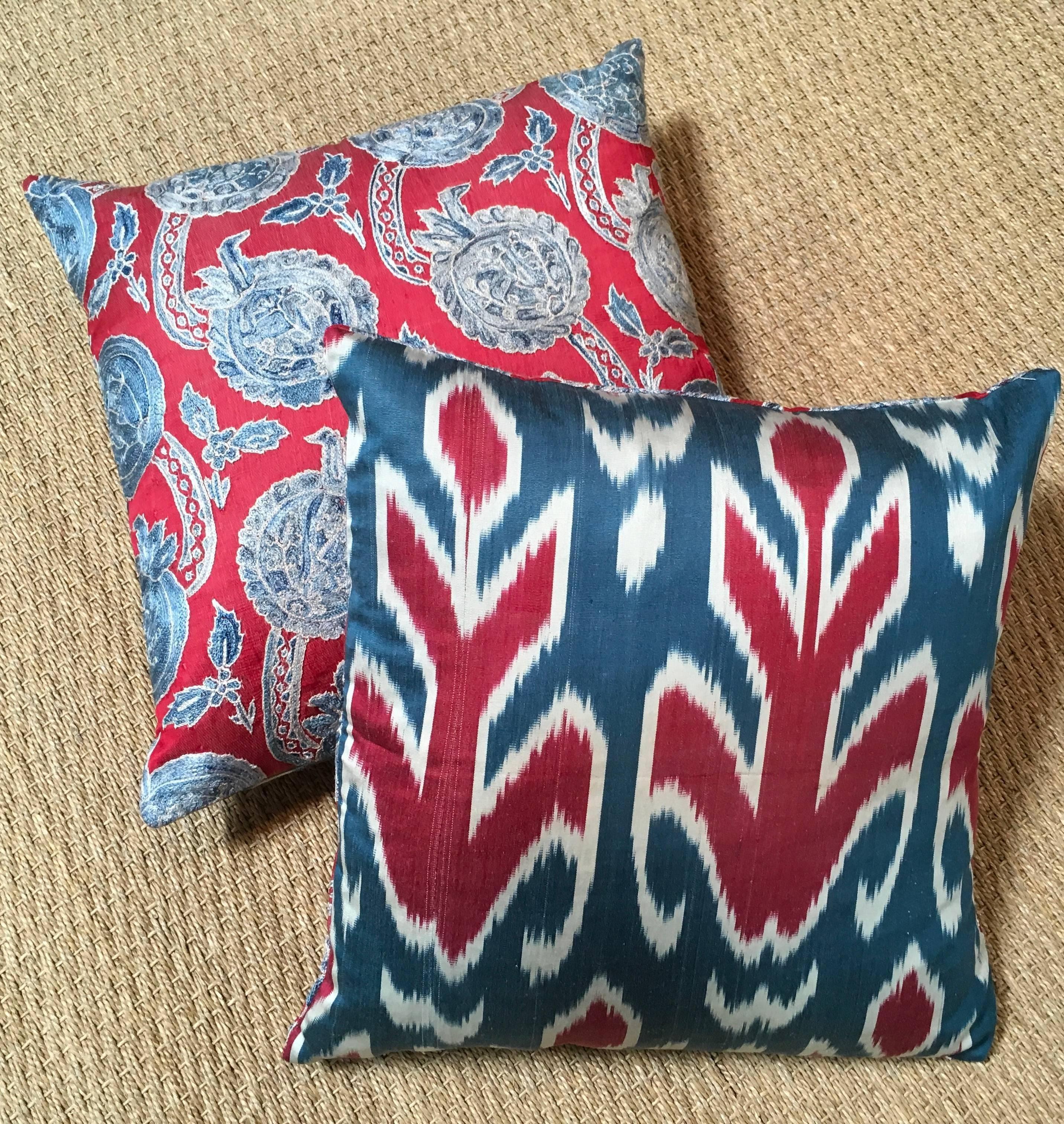 Pair of square Turkish hand embroidered throw pillows designed by Michelle Nussbaumer with contrasting Ikat silk fabric on reverse side.