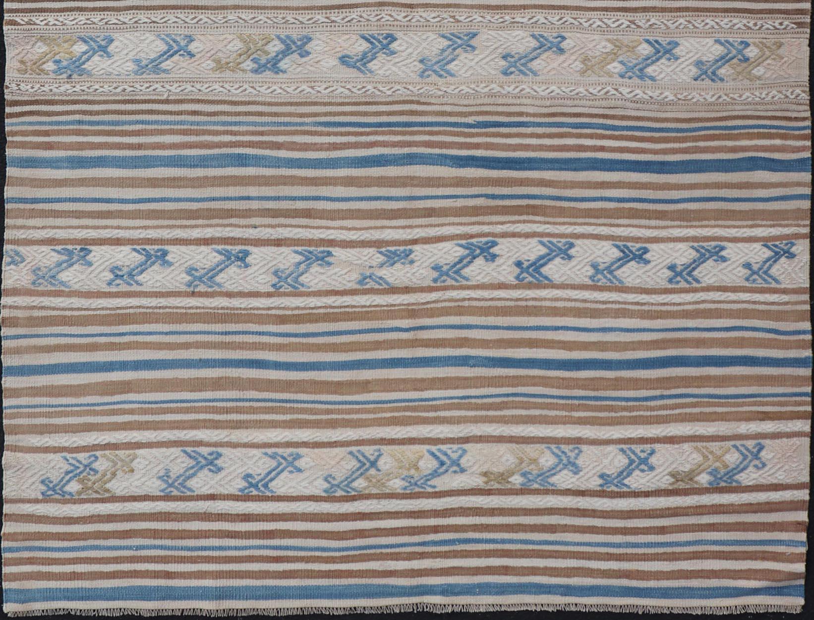 Vintage flat-weave Kilim with embroideries with a modern design in tan, brown, green and blue
geometric stripe design Vintage Kilim from Turkey, Keivan Woven Arts / rug EN-P13608, country of origin / type: Turkey / Kilim, circa 1950

Measures: