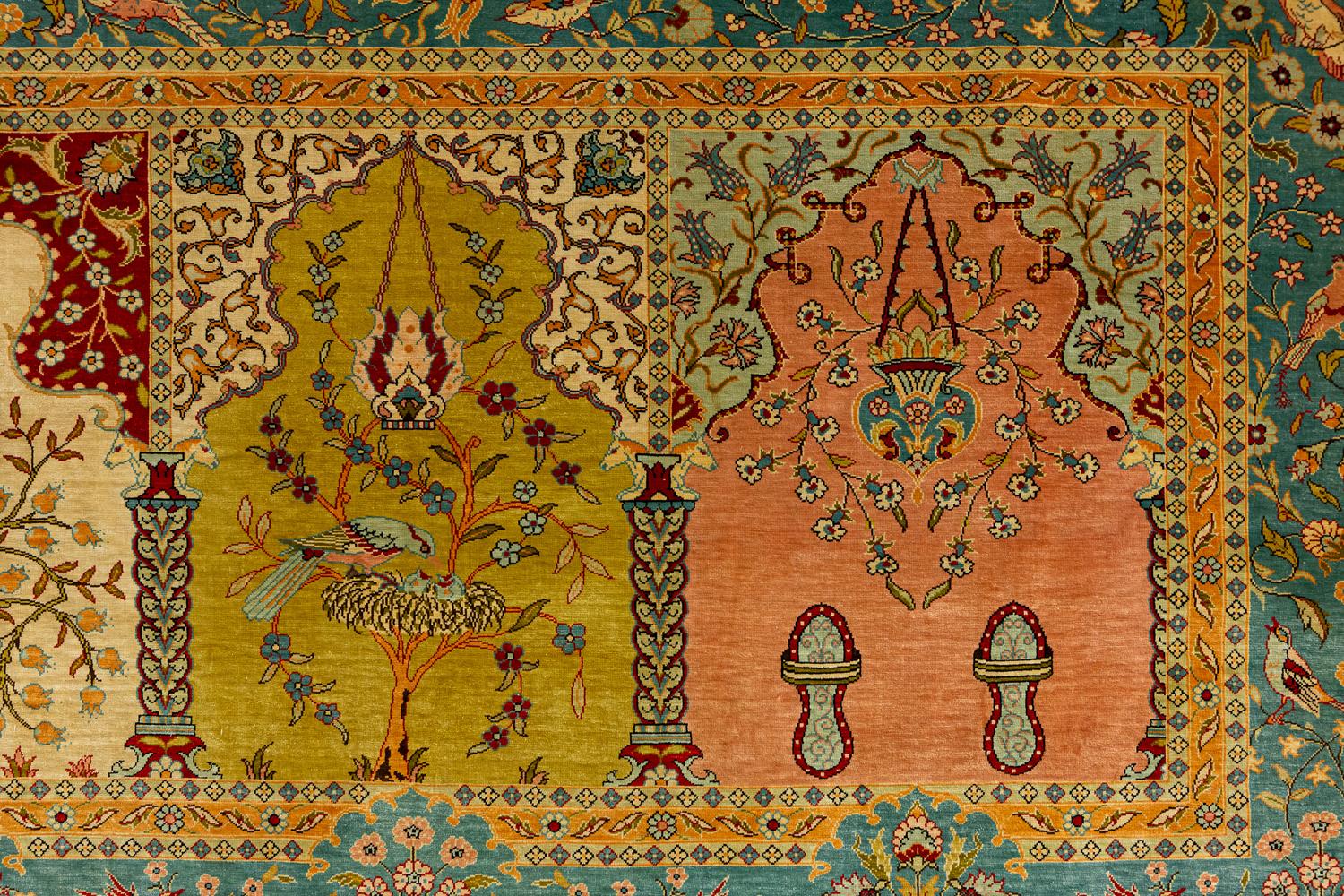 This is a semi-antique Hereke rug woven in Turkey during the mid-20th century circa 1950 - 1970's and measures 185 x 84 CM in size. This example has a unique “saf” design which is repeating panels containing mihrabs that are used for prayers. Each