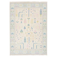 Türkisch inspirierter moderner Oushak-Wollteppich mit minimalistischem botanischem Design 9x12