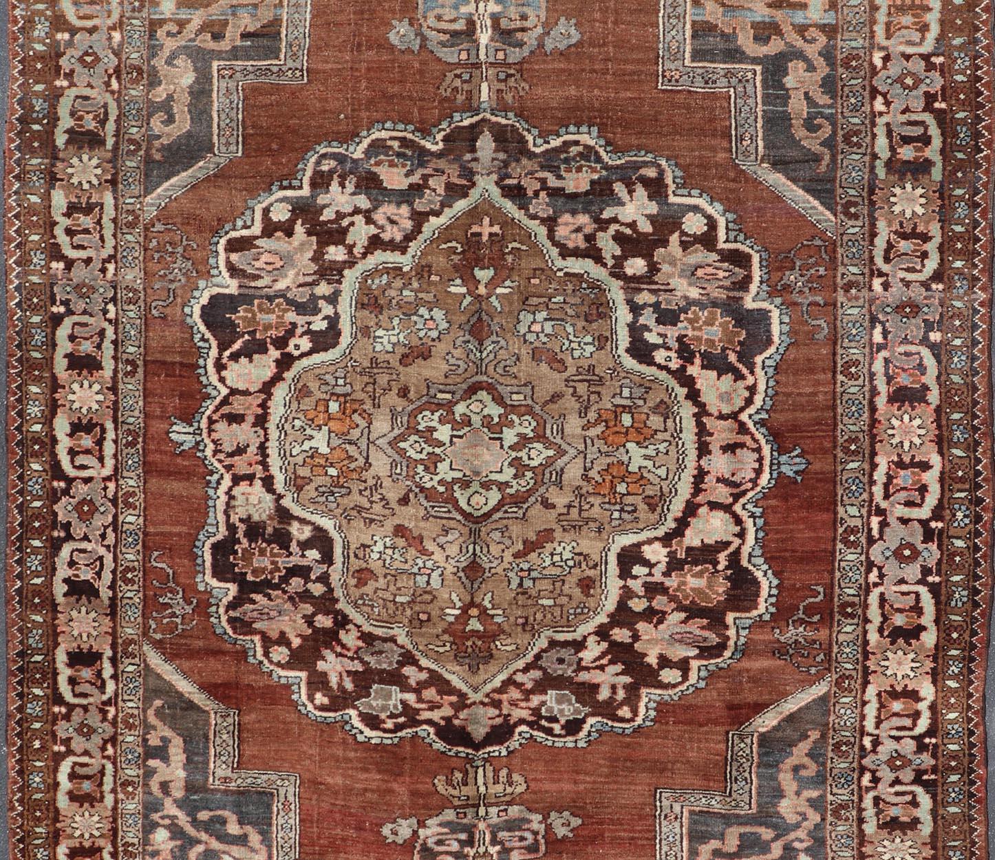 Hand-Knotted Turkish Kars Rug with Floral Medallion Design in Brown and Earthy Tones  For Sale