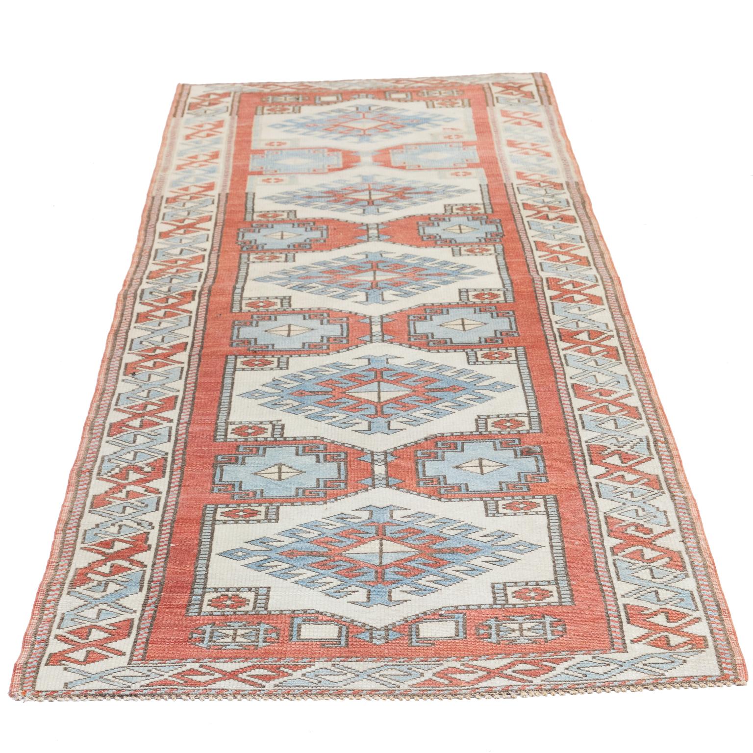 Turkish Kazak runner. Vibrant colors but a subtle look.