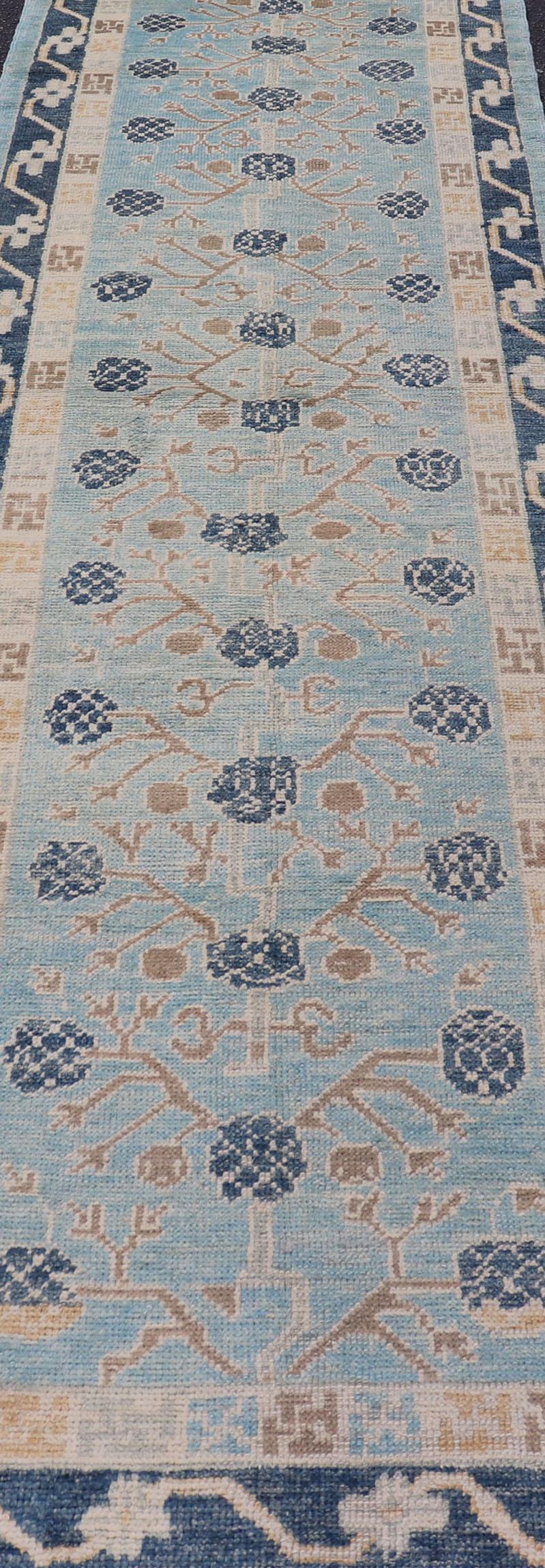 Contemporary Turkish Khotan Designed Runner with Pomegranate Design in Cream, Tan and Blues For Sale