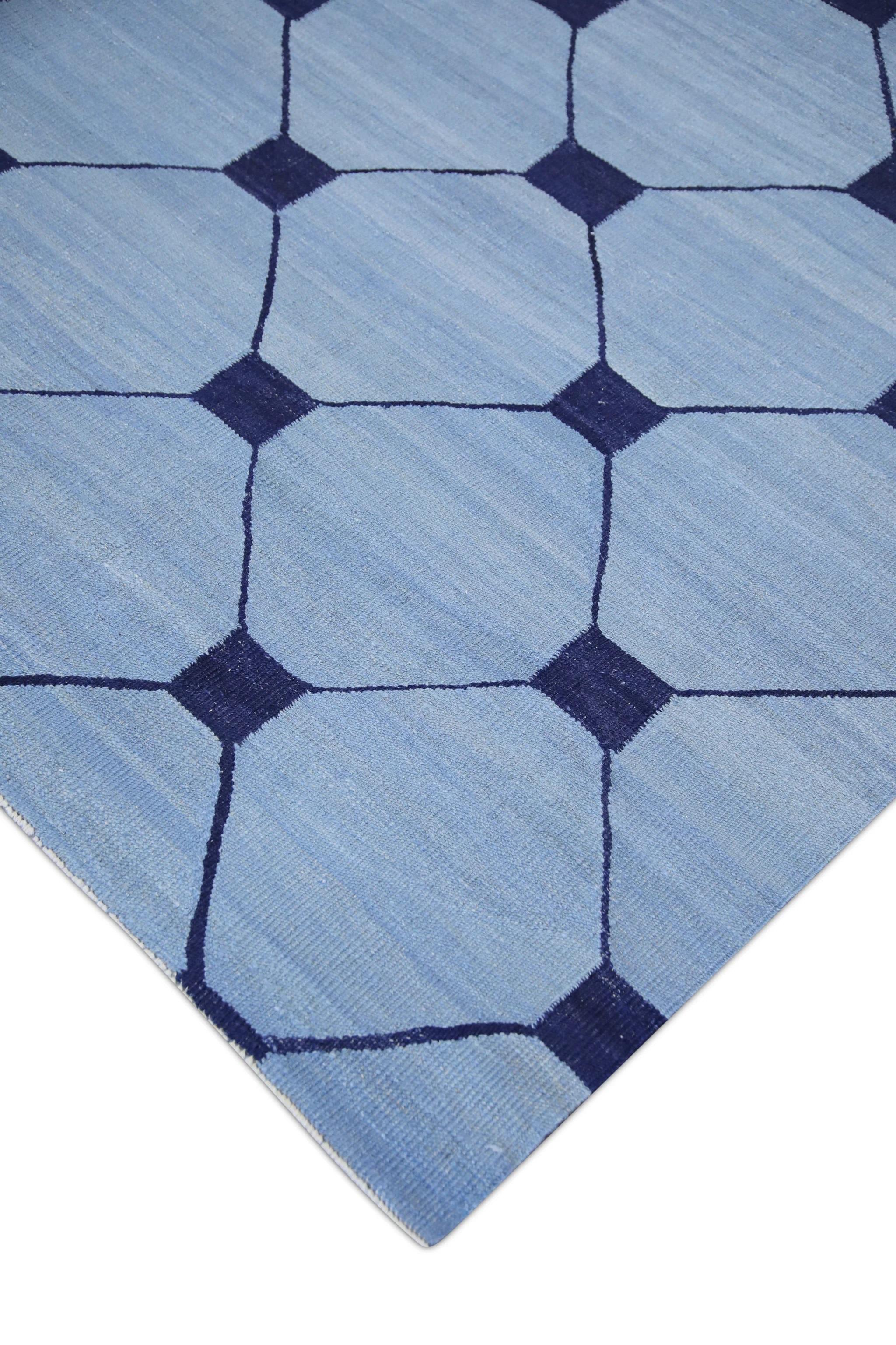 This early 21st-century Turkish Kilim rug, measuring 10'4